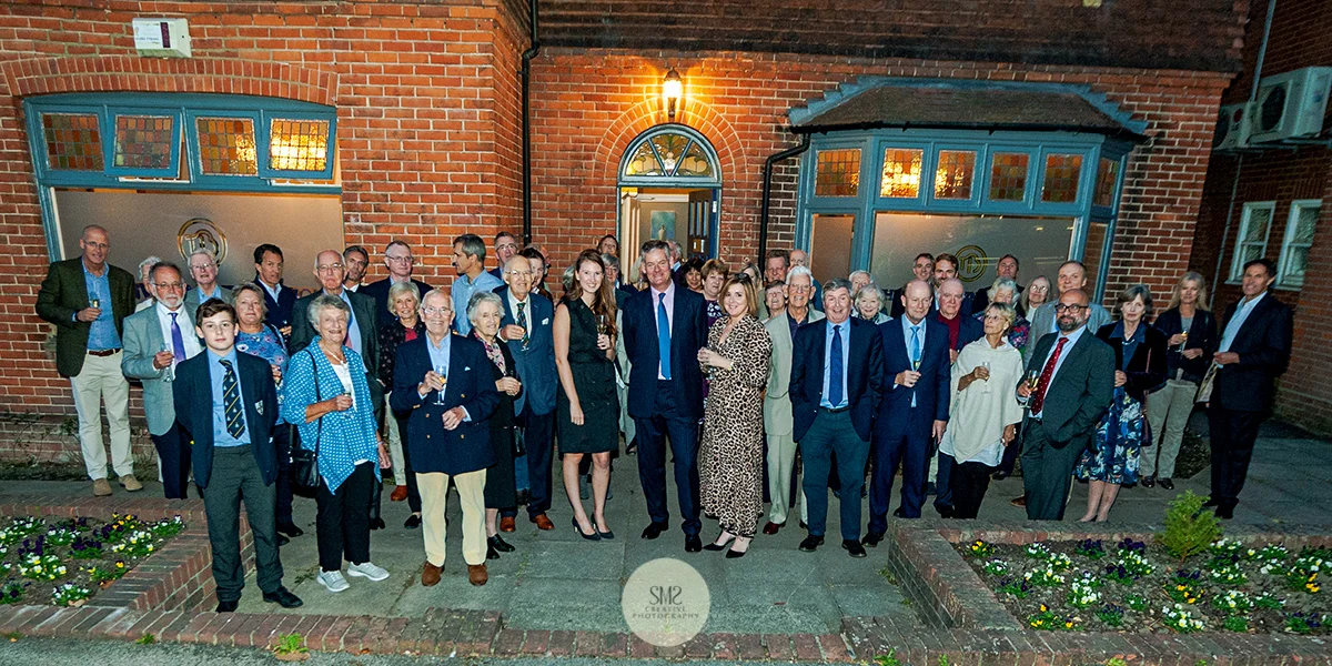 Guest outside The Investment Boutique with Richard Arris centre and Helena Bakunowicz on his right.