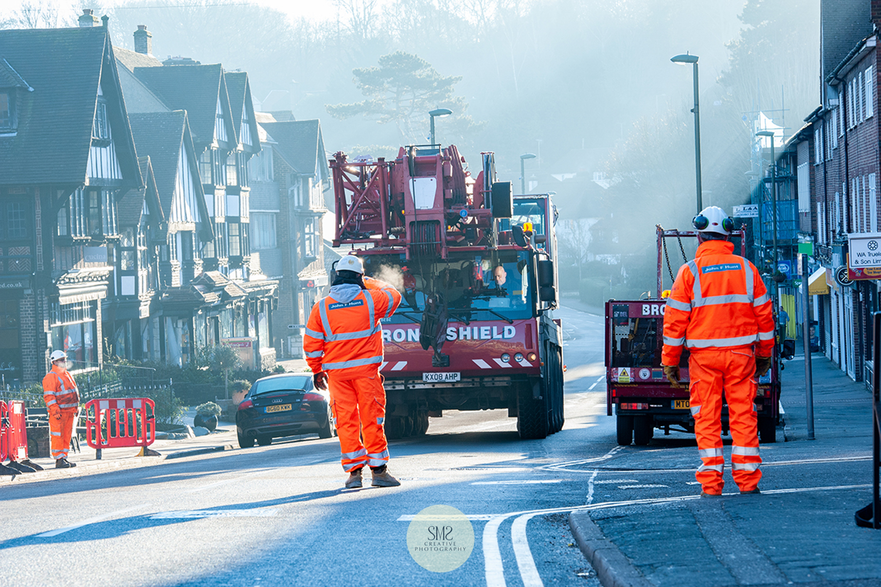 The arrival of the 60 tonne mobile crane on Oxted's Station Road East.
