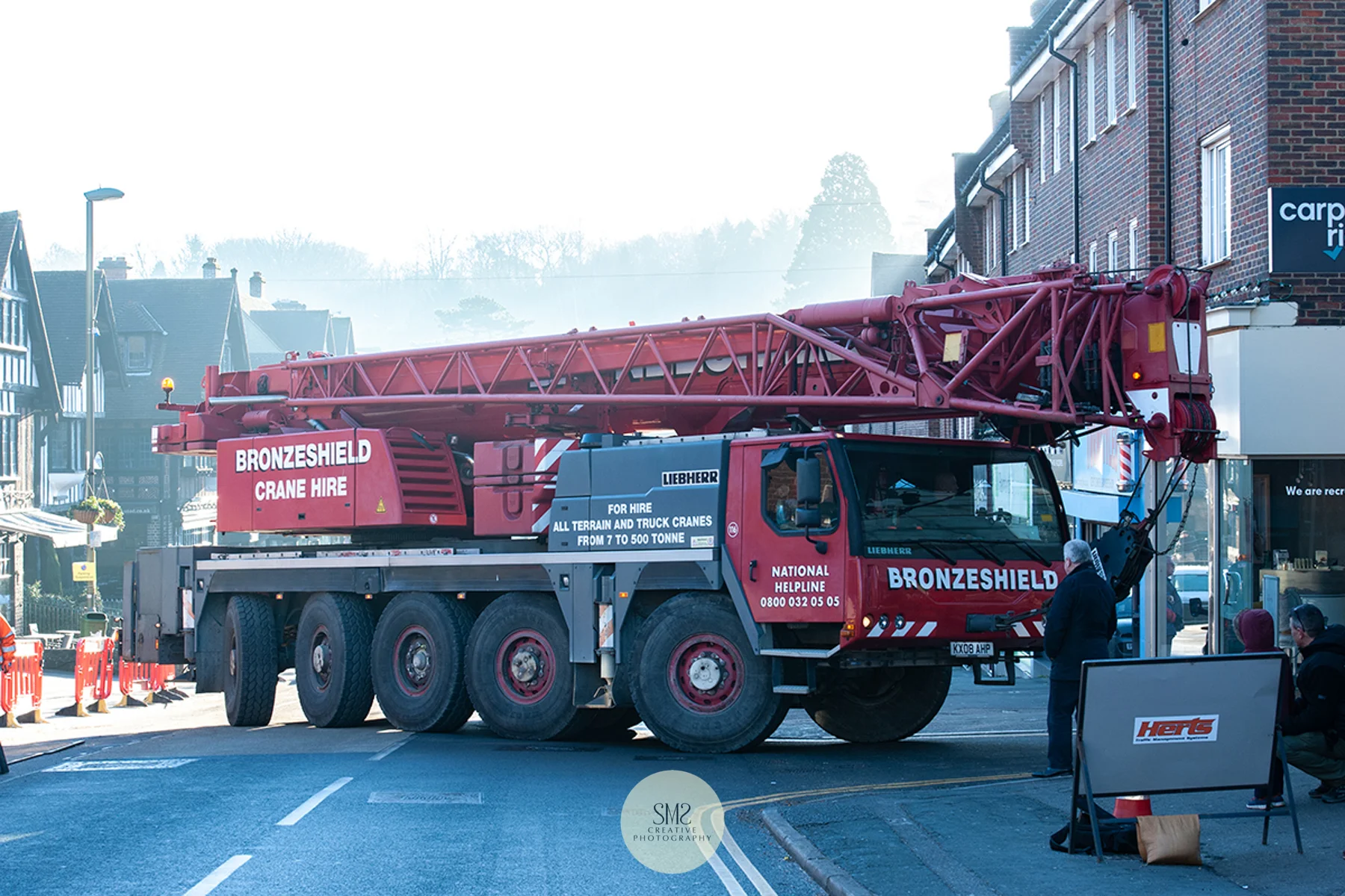 The crane making its way to the site for the start of the dismantling process.