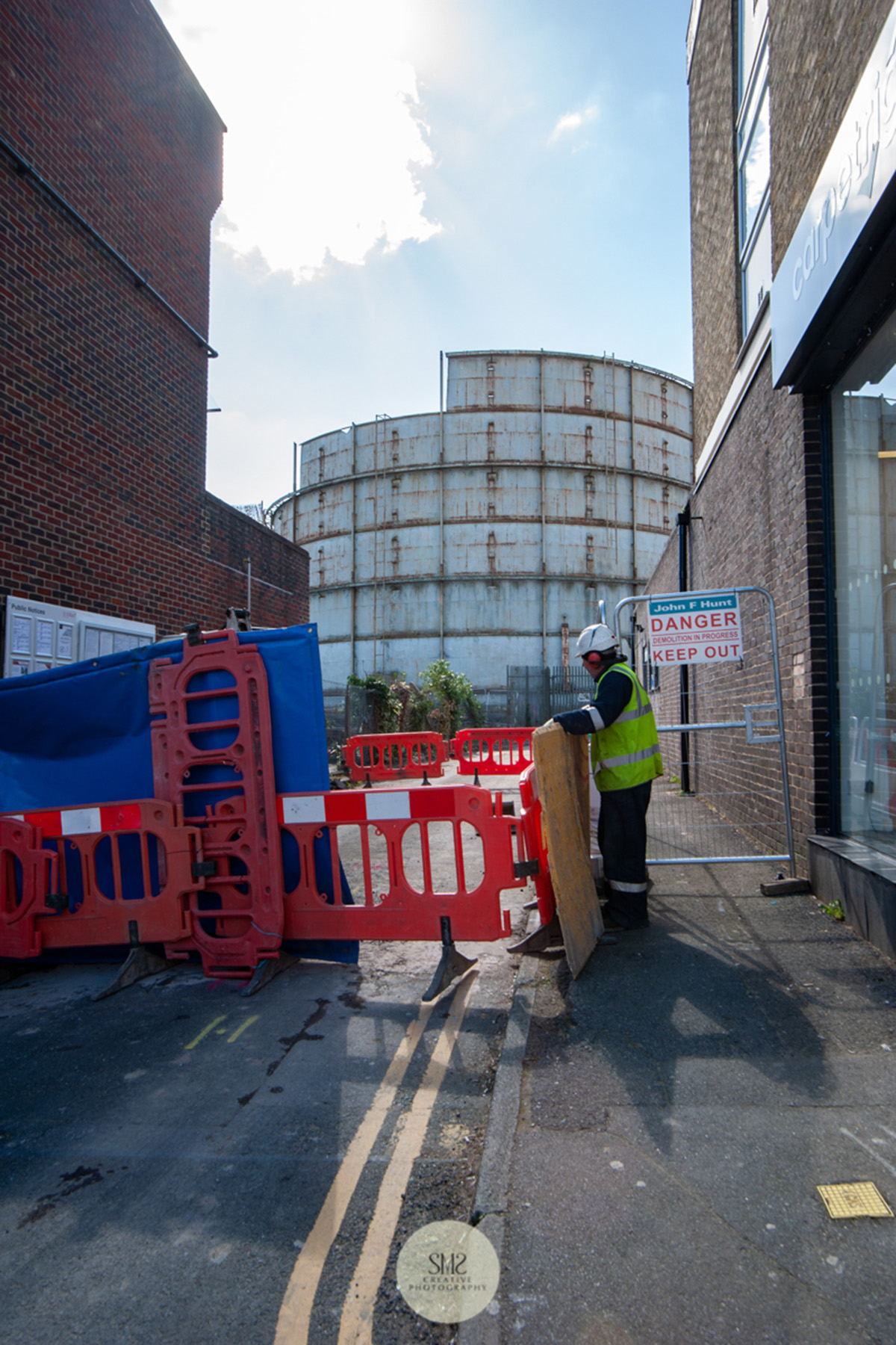 Workmen arrive to put the foundations in for the utilities.