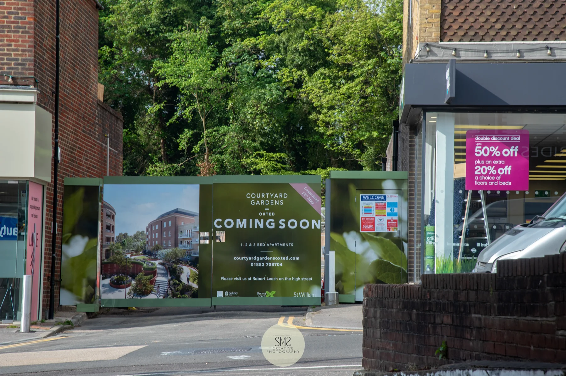 The gateway to Courtyard Gardens during the building works showing an image of what to expect.