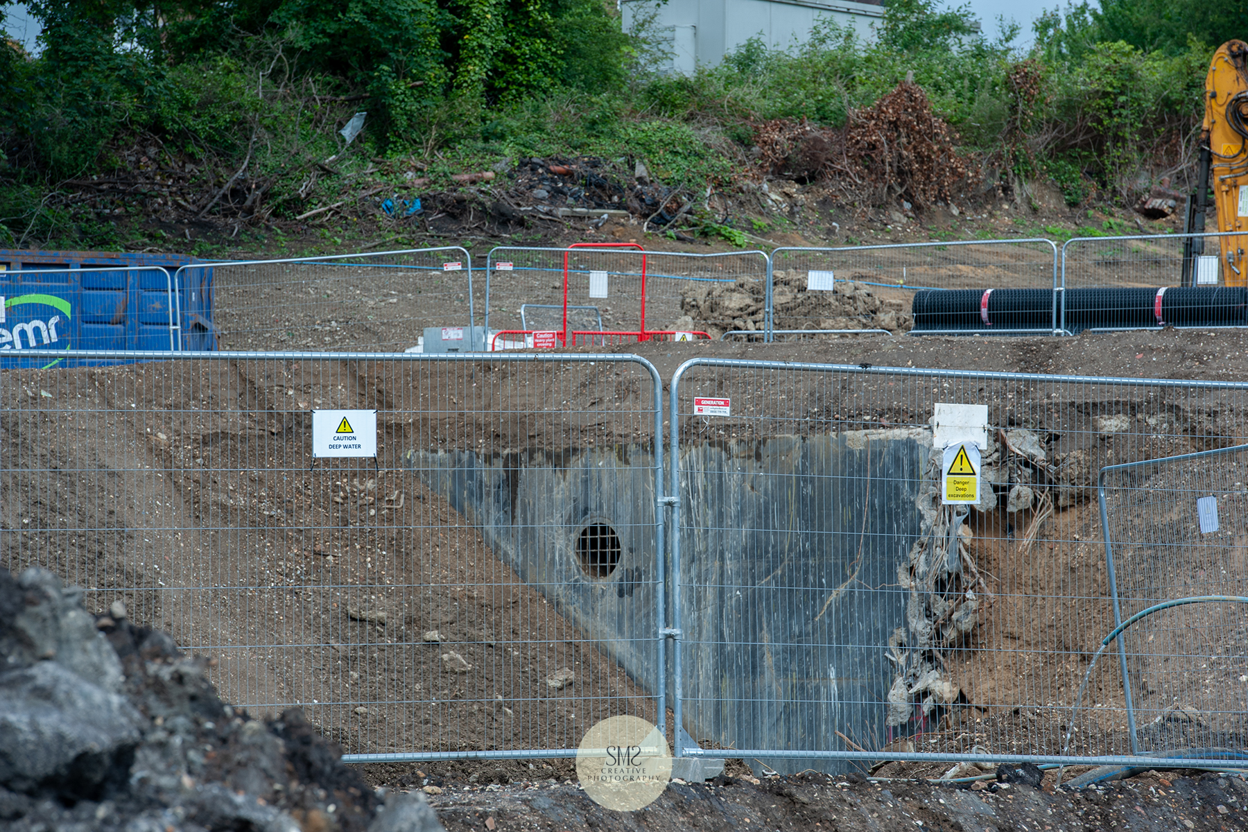 The remaining base of the gas holder is over one metre thick over 5 metres high/deep, is gradually broken down in preparation for the sheet piling.