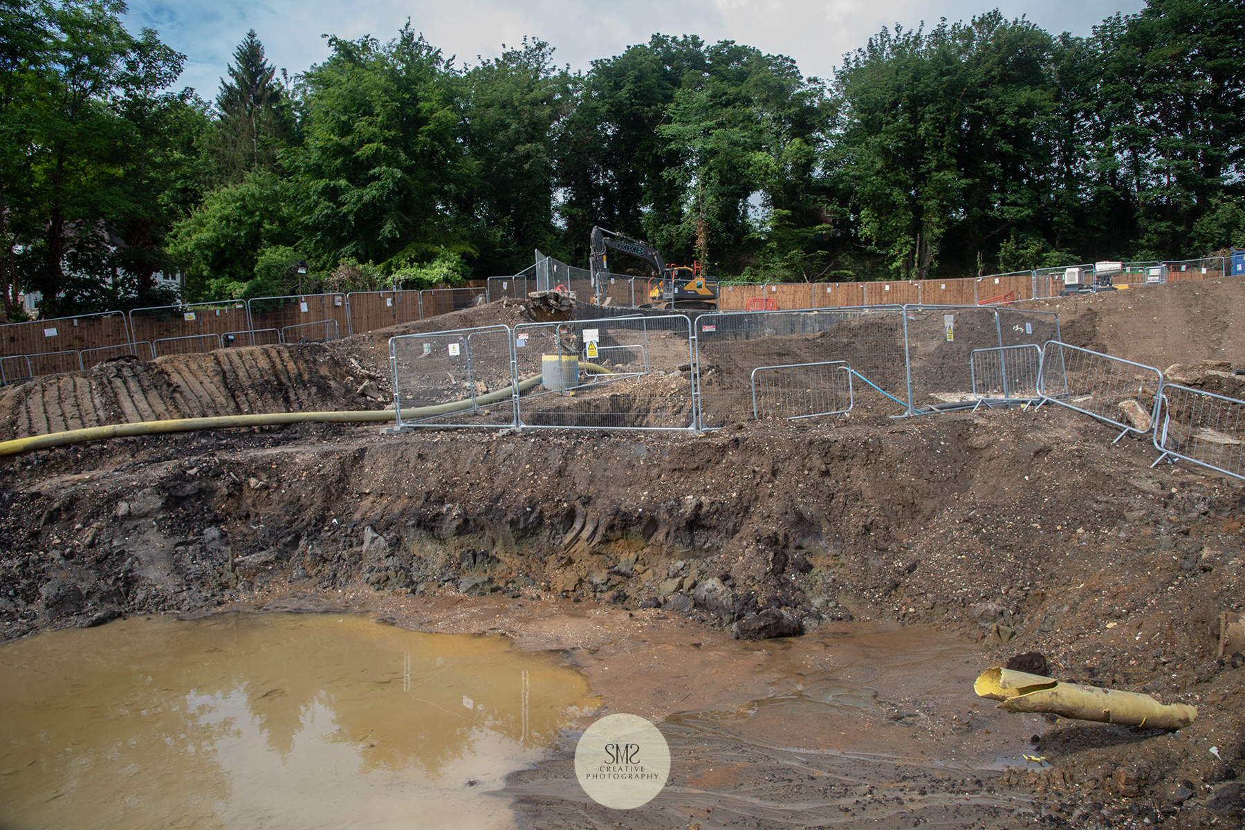 An excess of water due to the rainfall, a pump is brought in to drain it away.