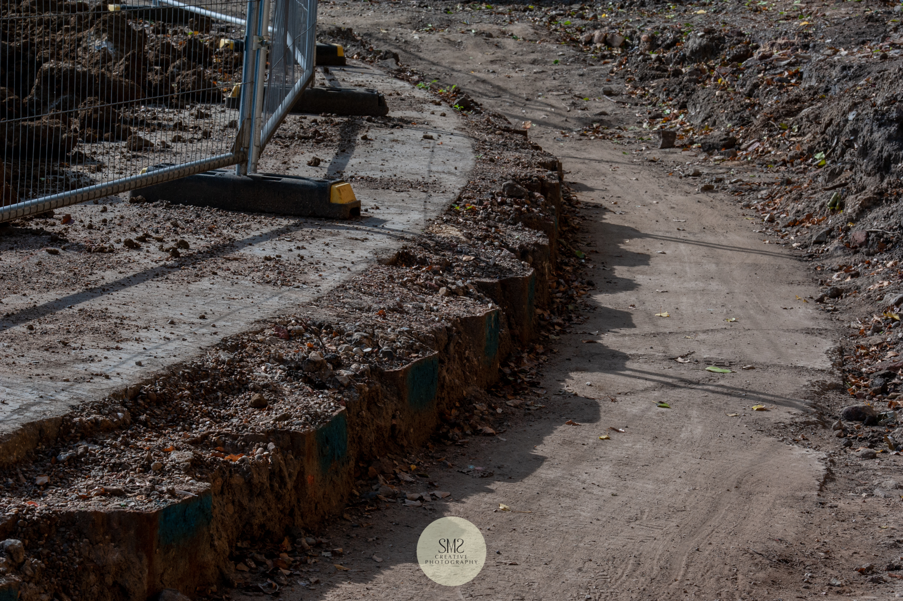 The edge of the base of the former gas holder is all that remains visible of where it once stood