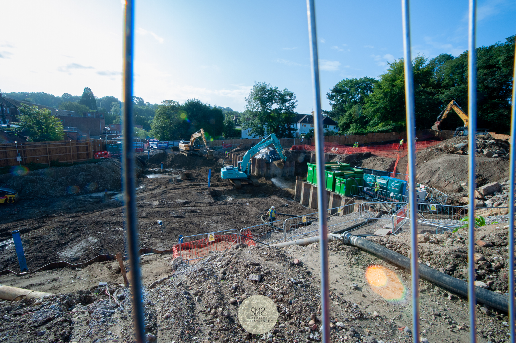 Ground clearance for the underground car park. The green tanks on the right are part of the water purification process.