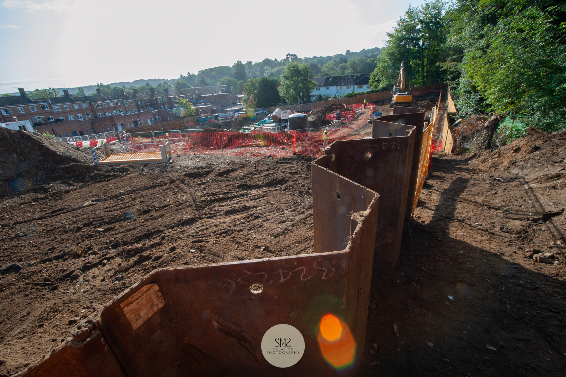 Looking over the top of the sheet piling on the perimeter of the site. This gives you an idea of the height of the sheet piling as it protrudes above ground level. Sheets are supplied in different lengths.