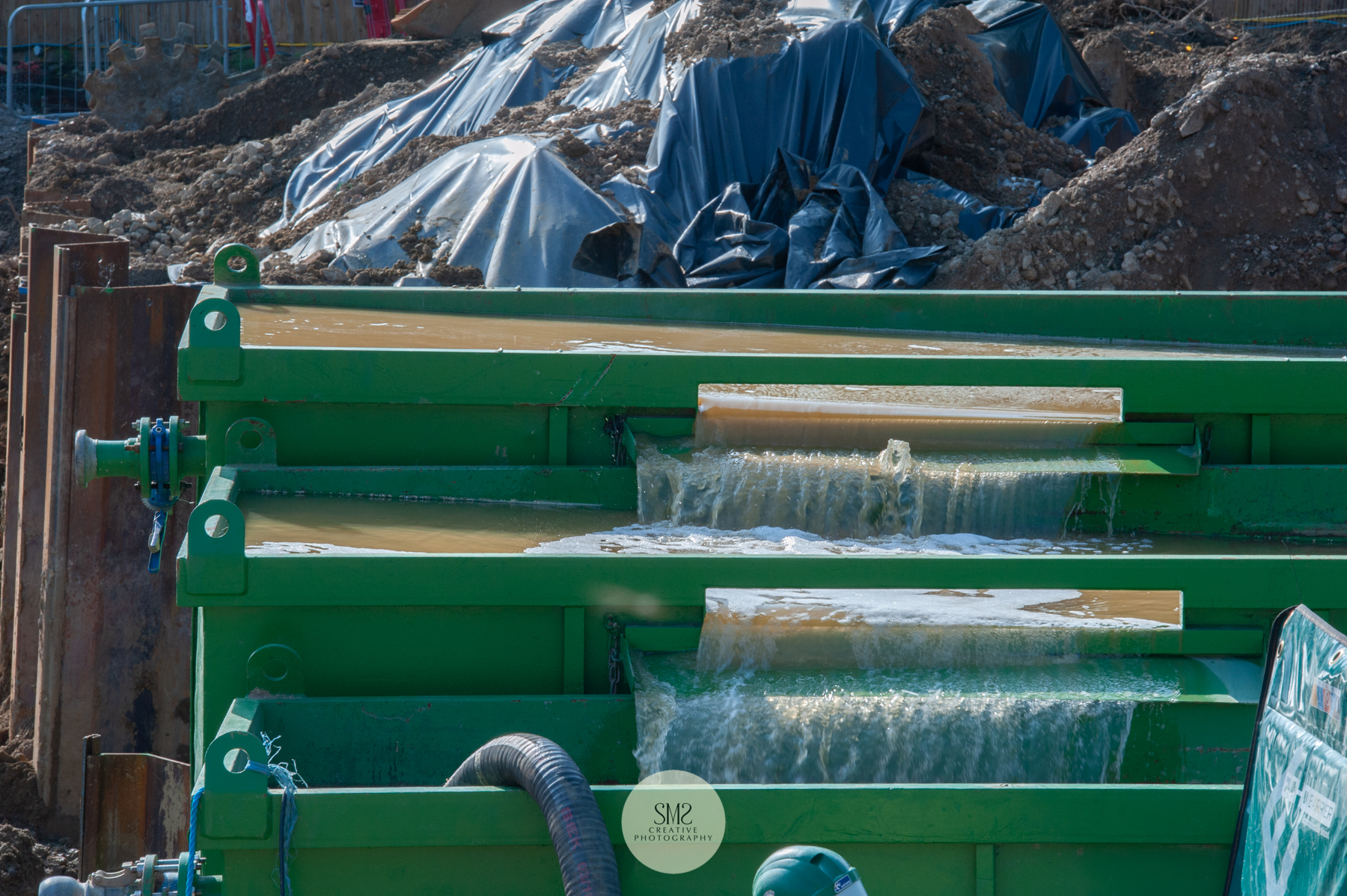 Water that collects at the lowest point of the site is pumped into three tanks that take care of the water purification process, this is then pumped up to the top of the site to a holding tank for disposing of.