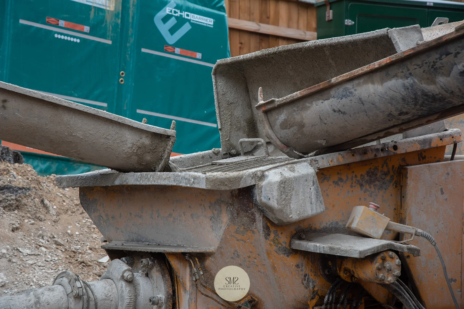 The shute system that delivers the cement via a hose to the auger.
