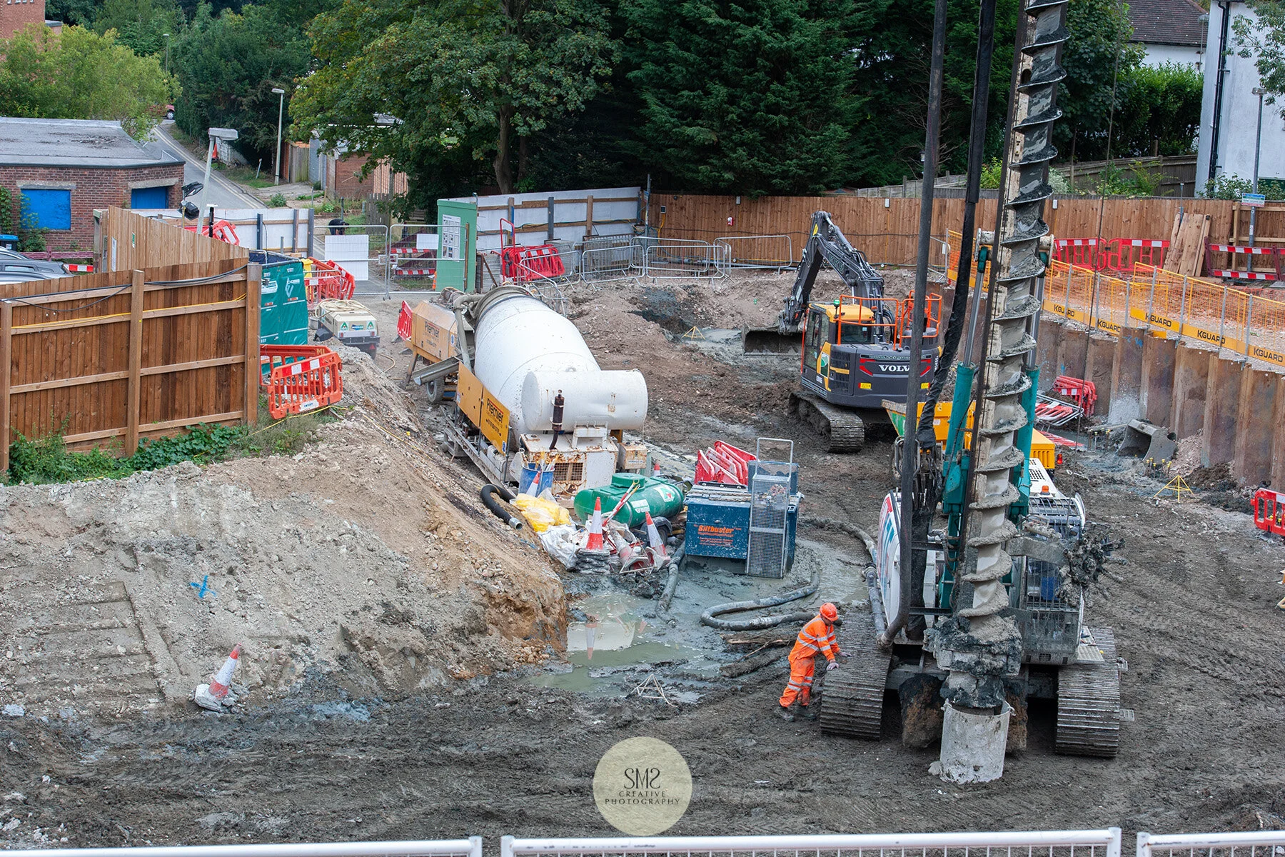 A view from behind the auger and digger where the metal ‘cradles’ were inserted. This is where the former Johnsdale car park was once located. You can see the yellow triangle shapes that identify the location of the foundations.