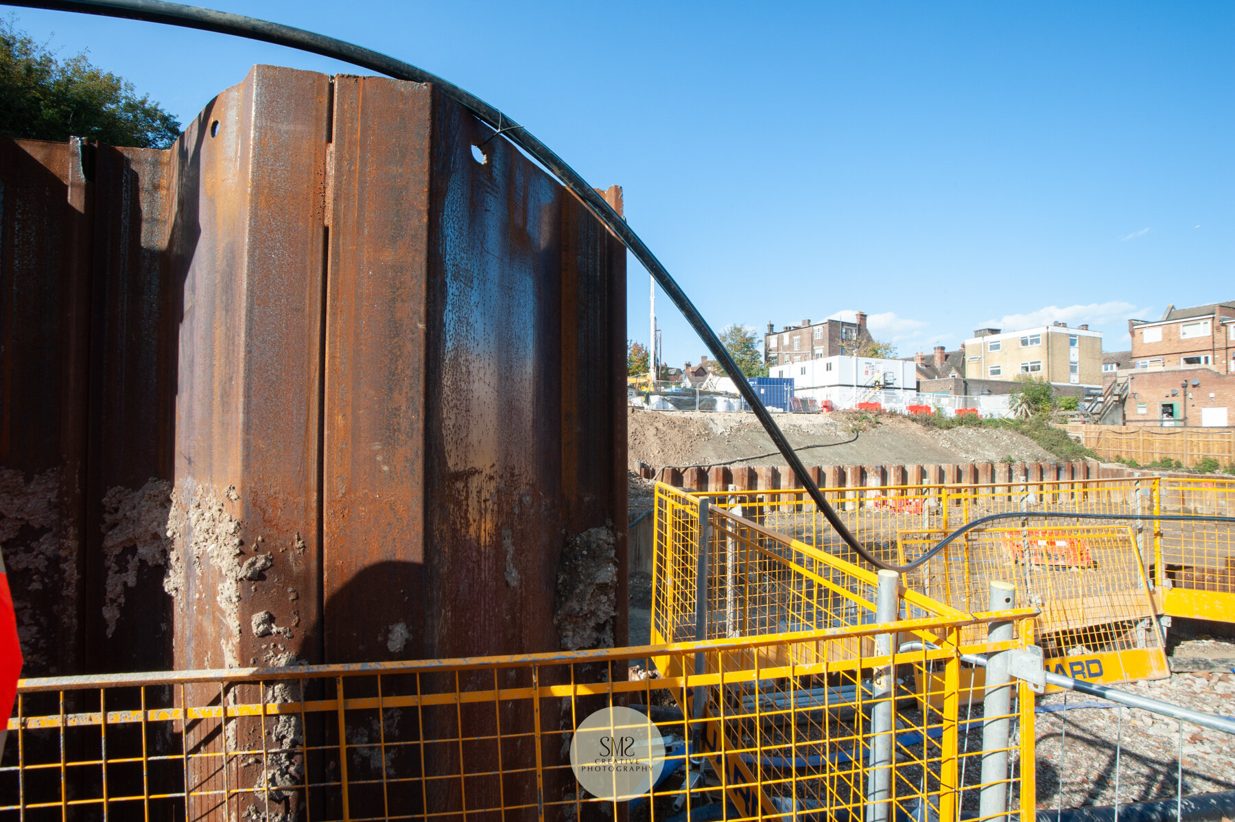  Sheet piling above ground level with cable. 