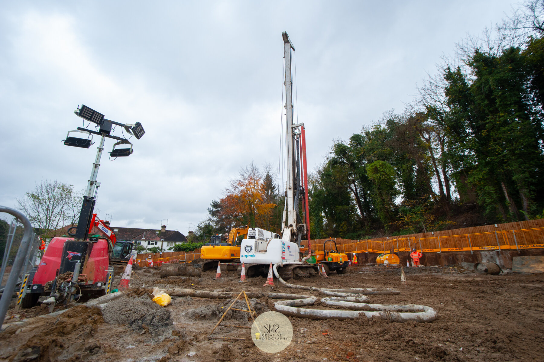  The other piling rig completing the process of the auger drilling the holes for the concrete to be pumped into the hole, then the steel ‘cages’ are pushed in. 