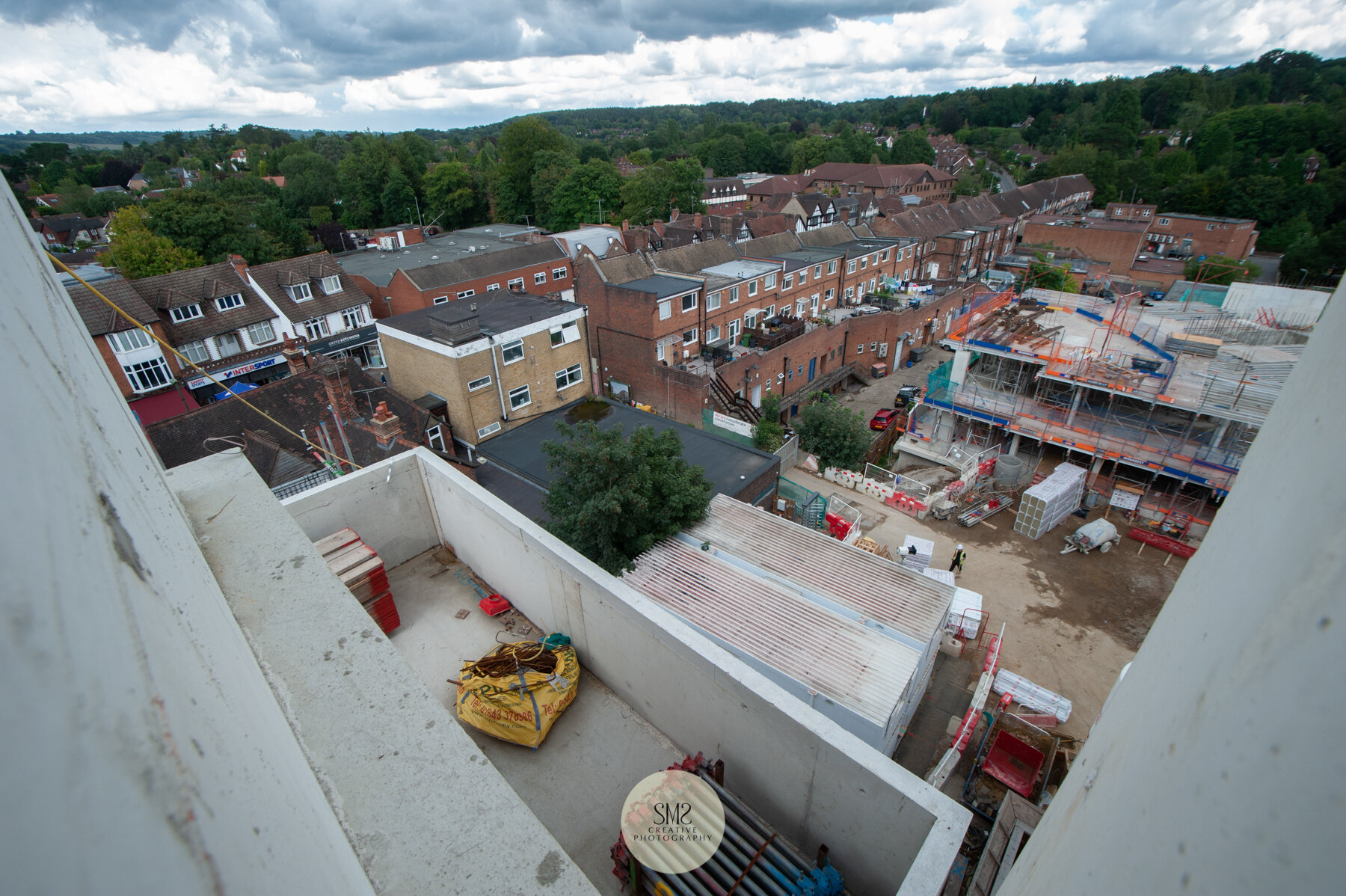  Looking down from Block A showing a terrace and looking over Block C. The entrance to Courtyard Gardens can be seen in the centre of the picture. 