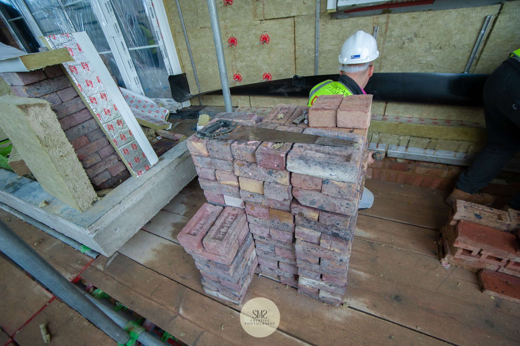  Bricklaying in progress on Block A. 