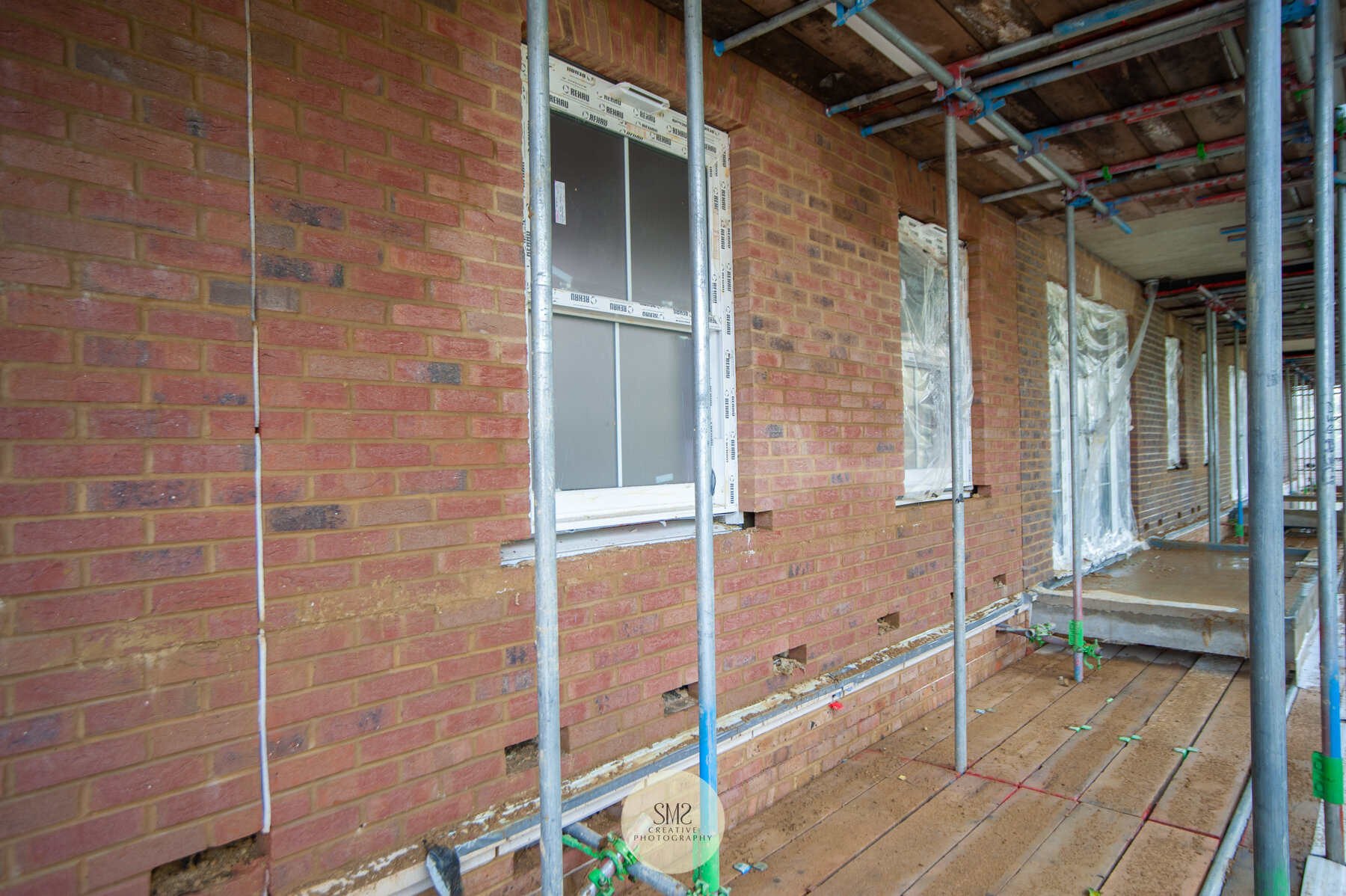  Finished brickwork Block A level 3. Purple brick colour shown on the left of the picture. 
