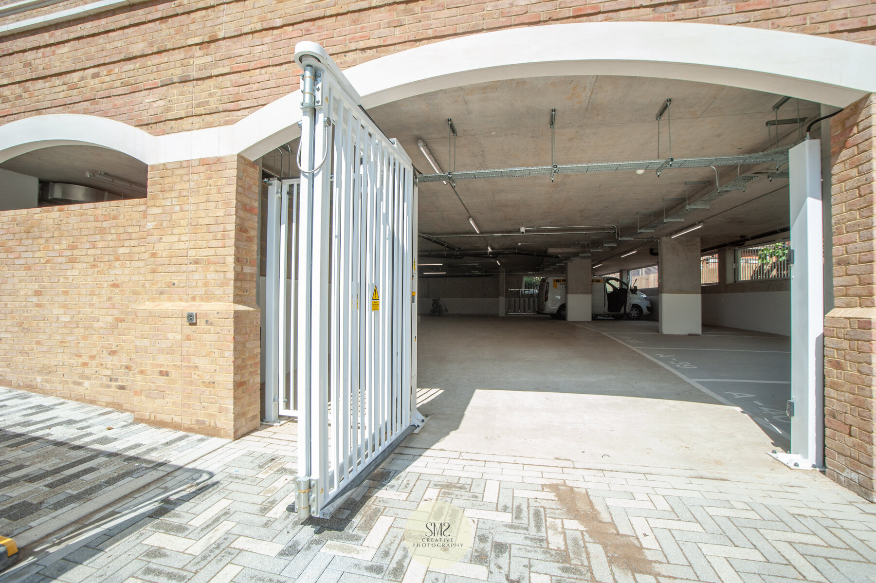  The gated entrance to the car park for Block A giving each apartment space to park. 