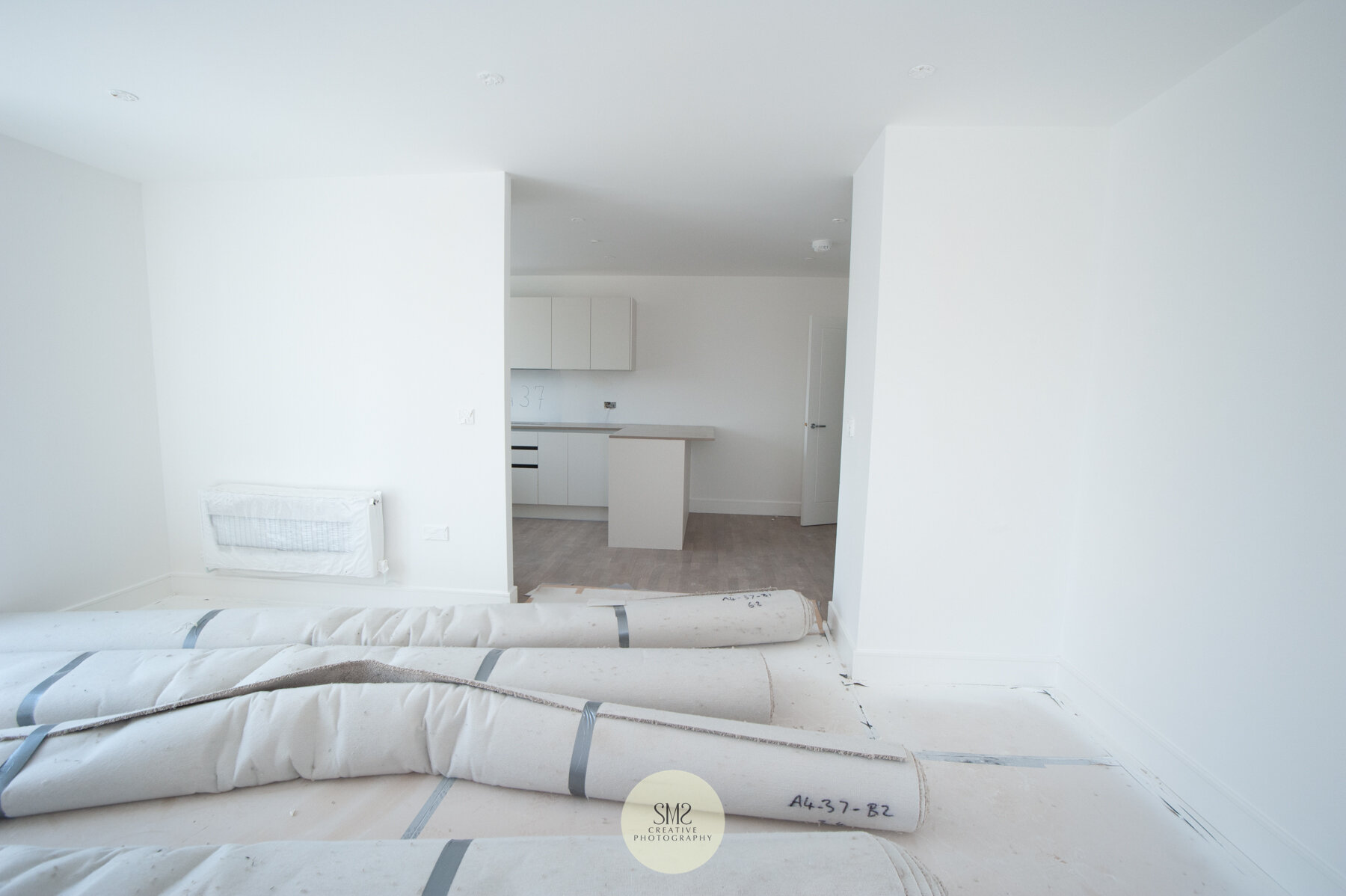  The living room in a three-bed apartment nearing completion. 