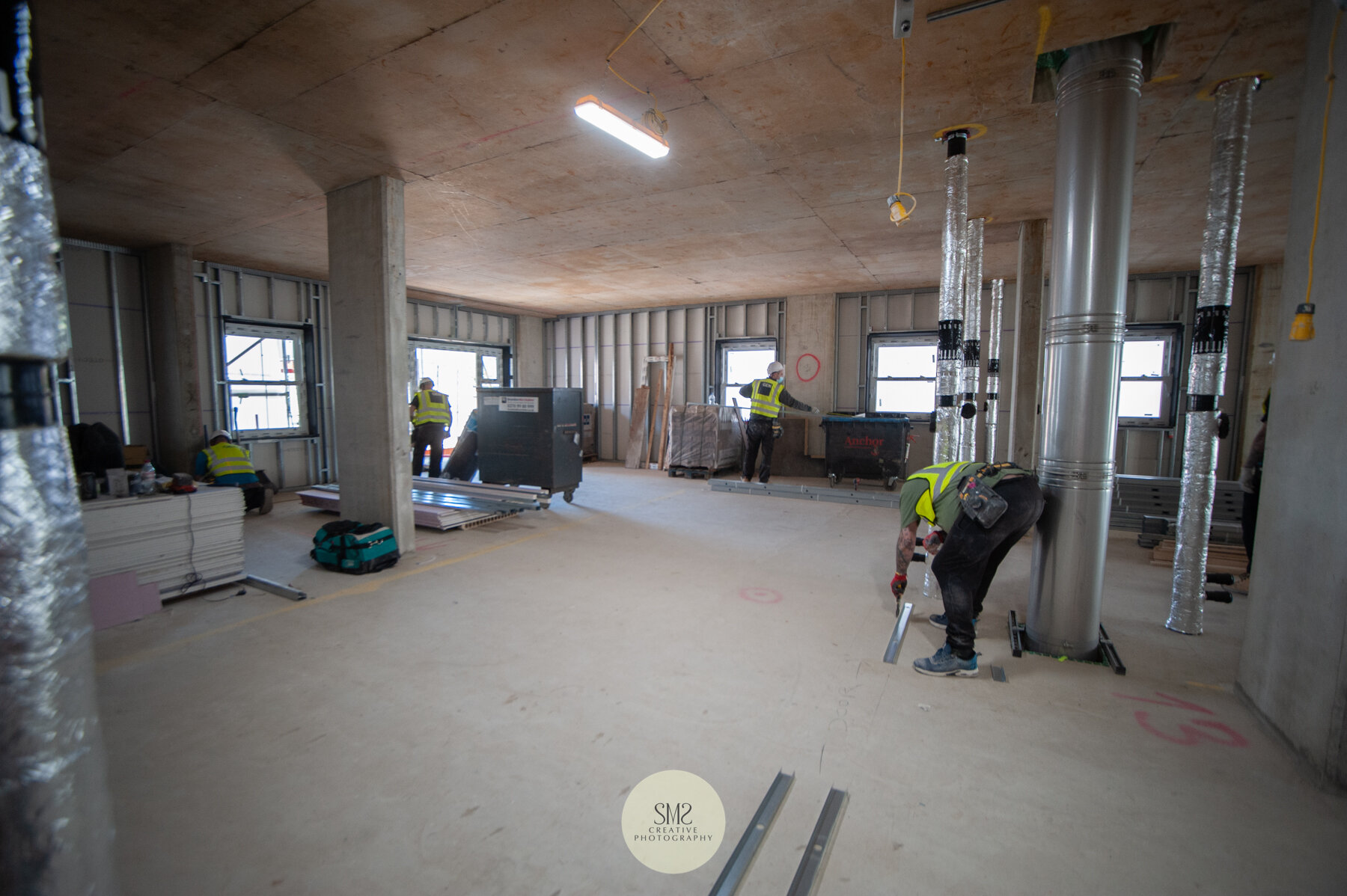  Inside Block C – laying the tracking for the individual apartments to be constructed. 