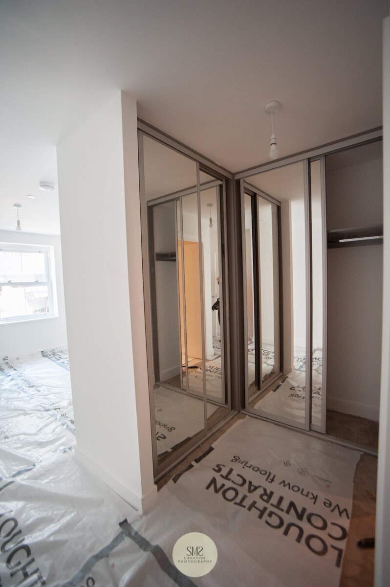  Fitted wardrobes and dressing area in master bedroom Block B 