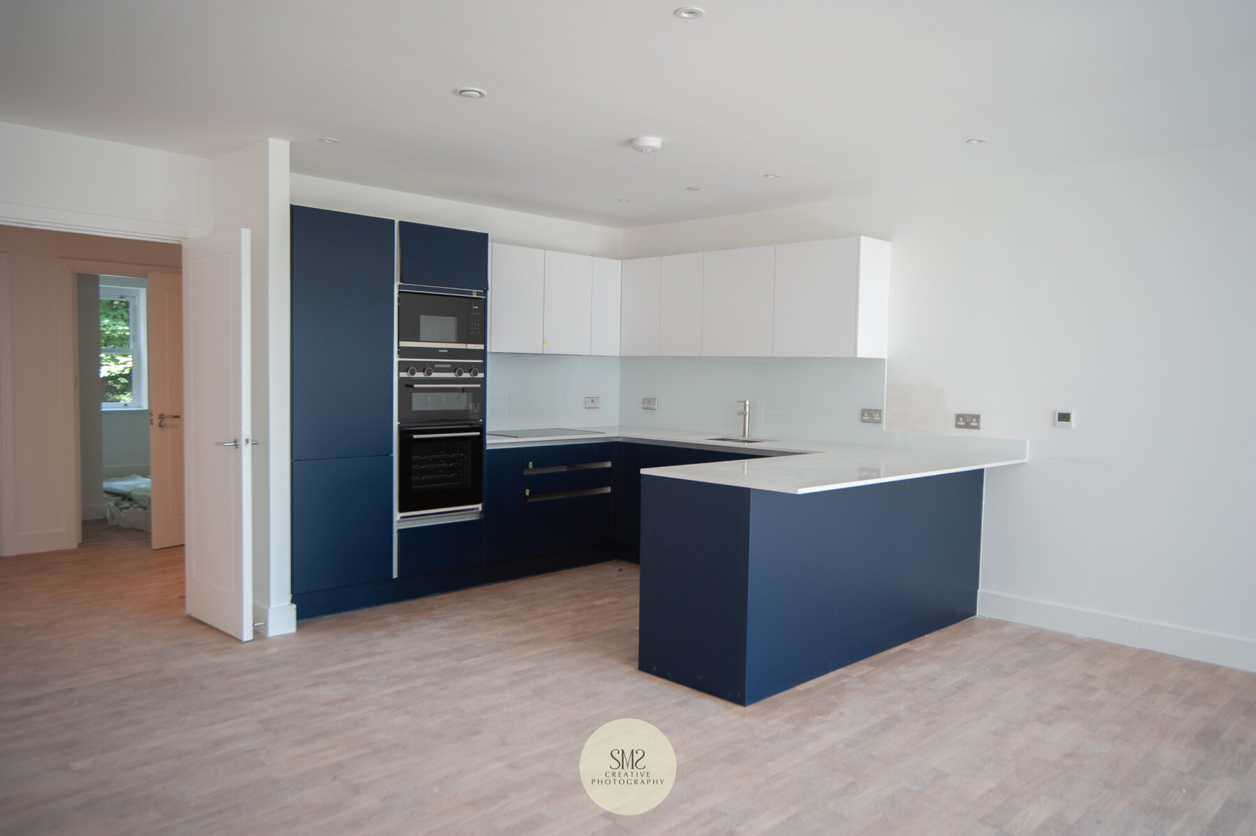  A lovely navy kitchen in open plan living area in Block B 