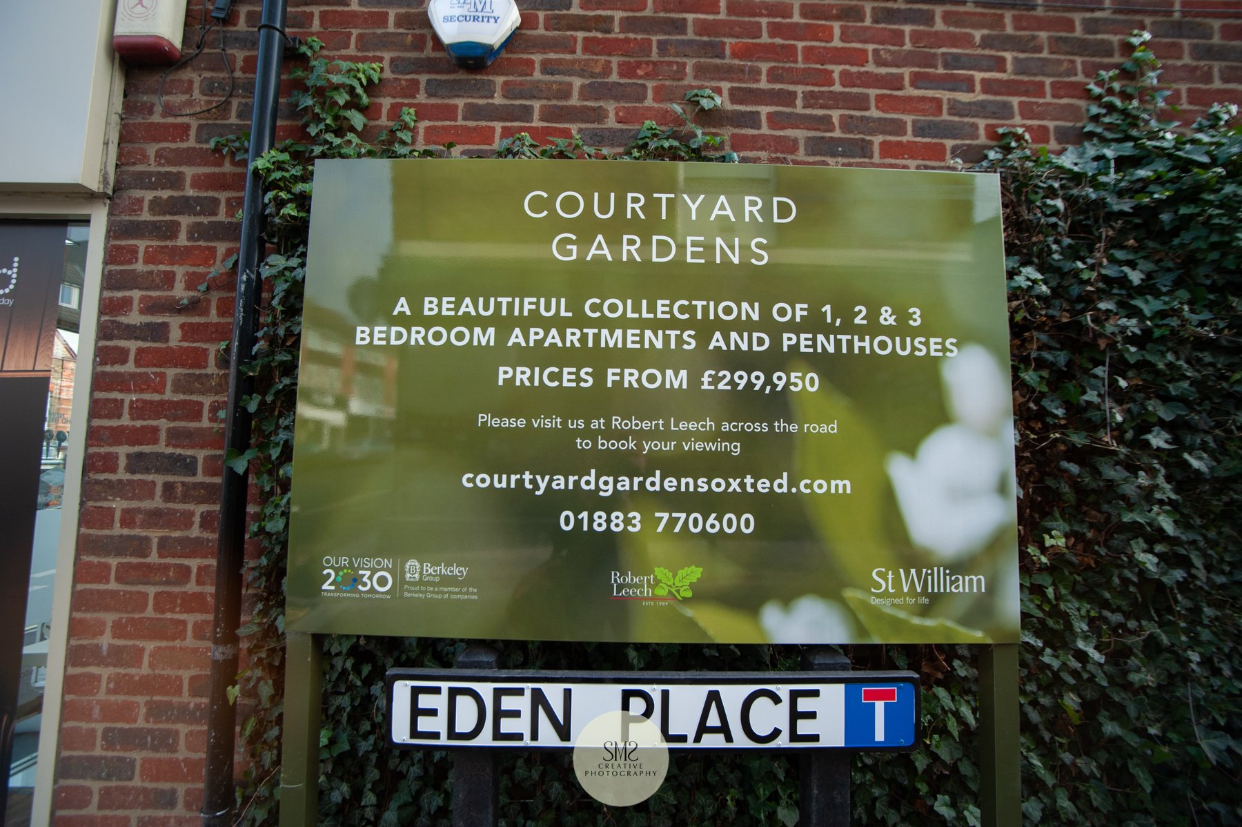  The entrance to Courtyard Gardens from Station Road East, Oxted. 