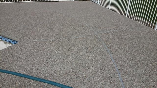 Exposed Aggregate Around Pool.jpeg