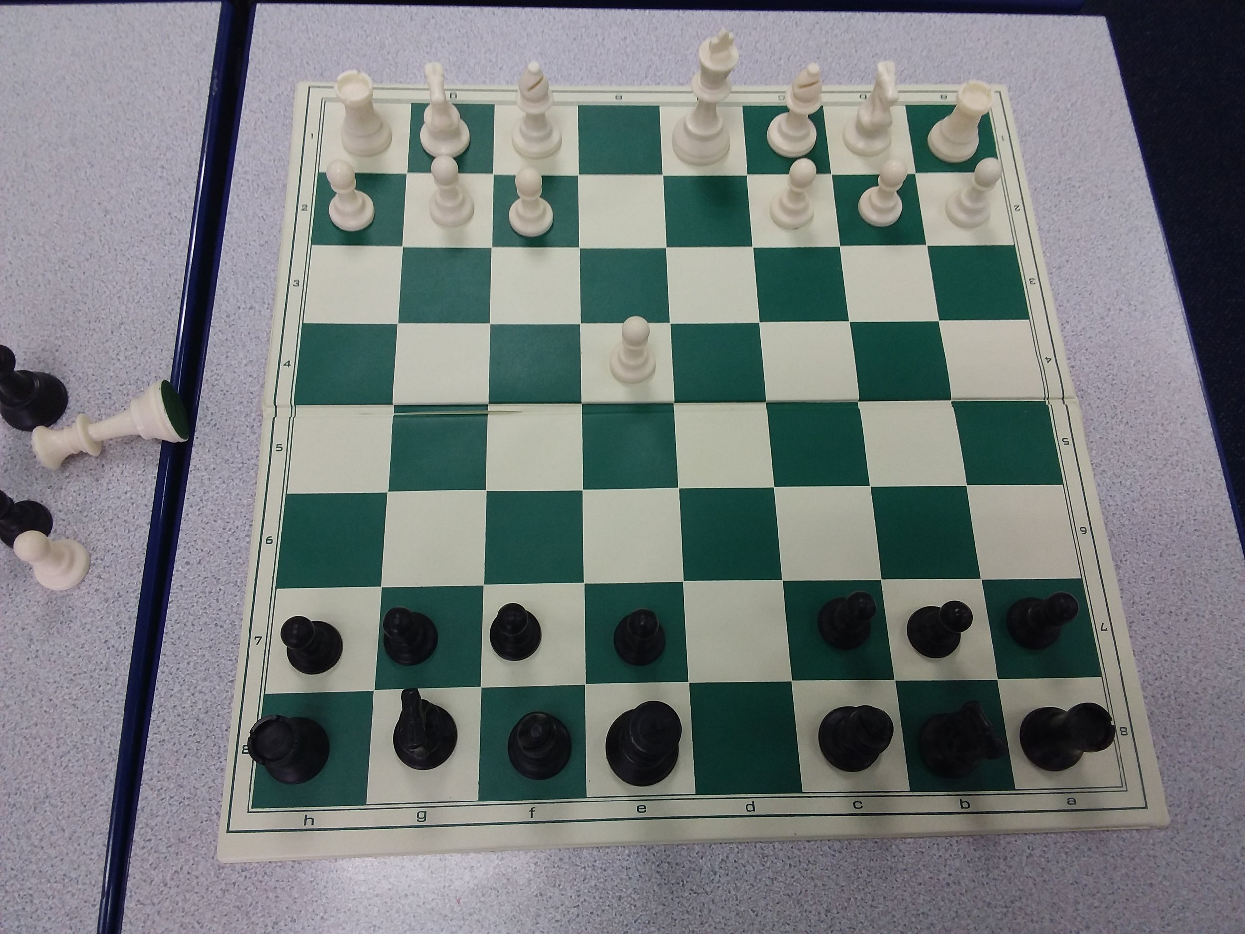 The position after the pawns and then the queens have swapped off. White can no longer castle.