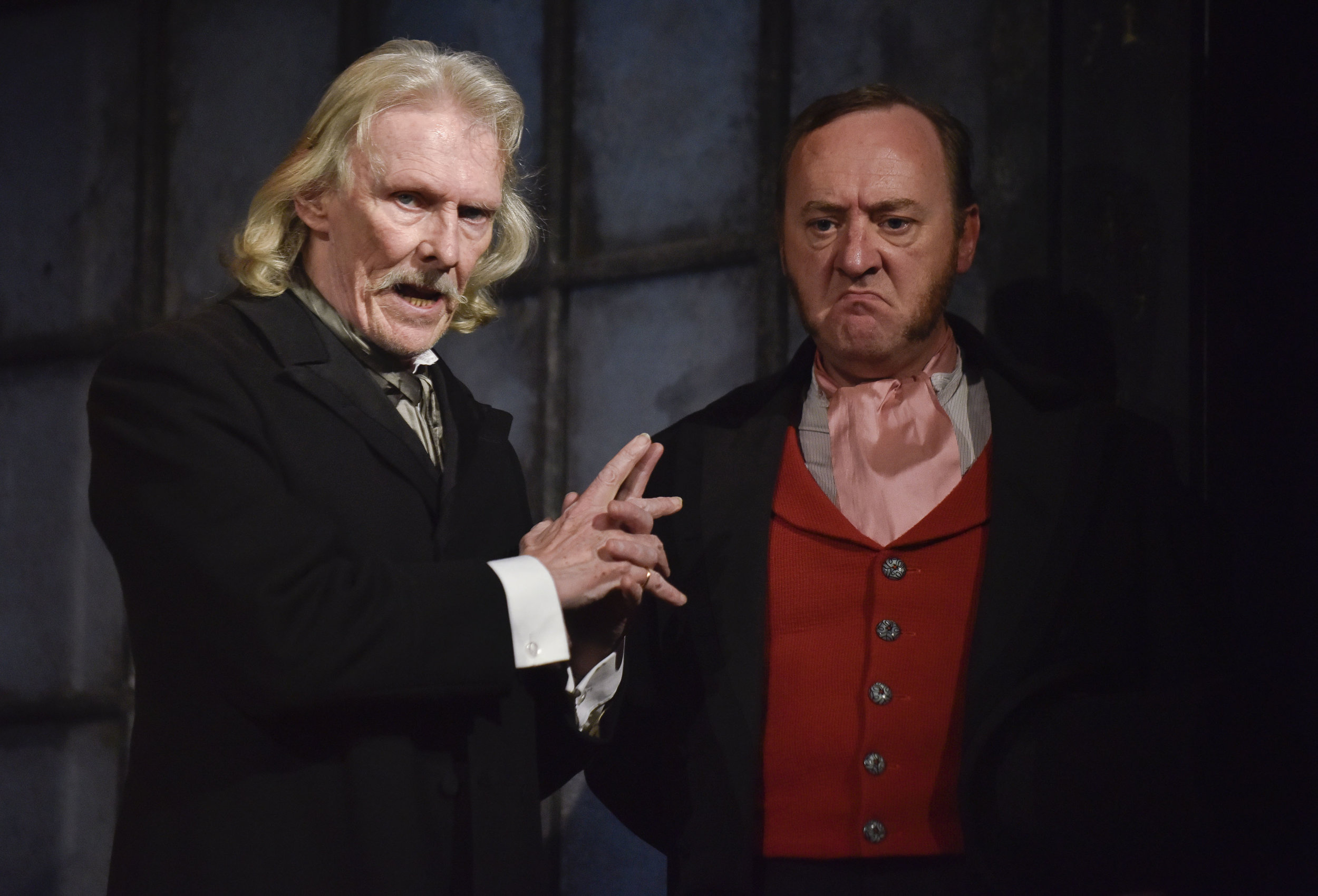 Cliff Burnett as Mr Gradgrind and William Travis as Mr Bounderby.jpg