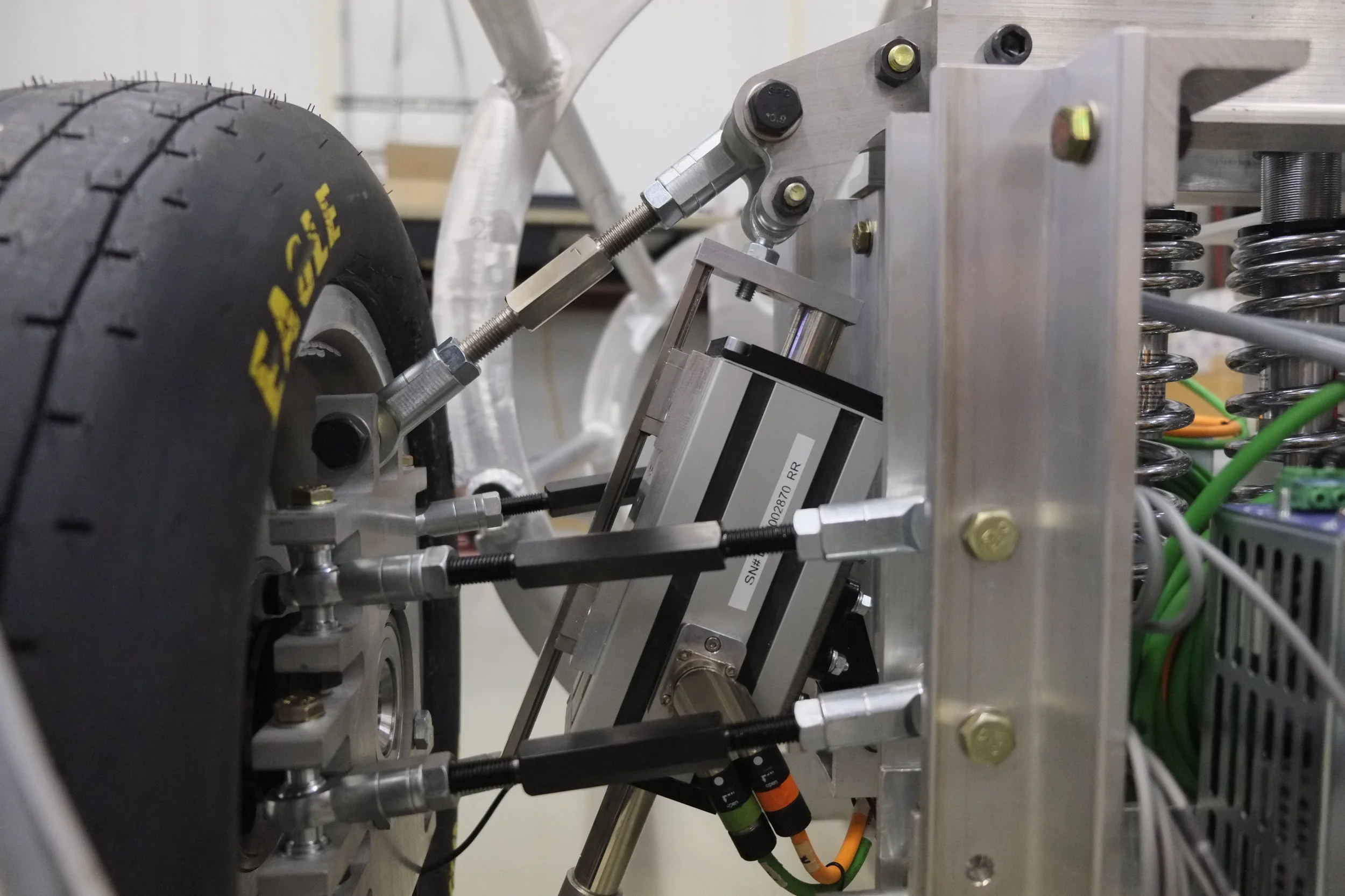 A detail of ales tech's suspension on uf Gatorloop's pod