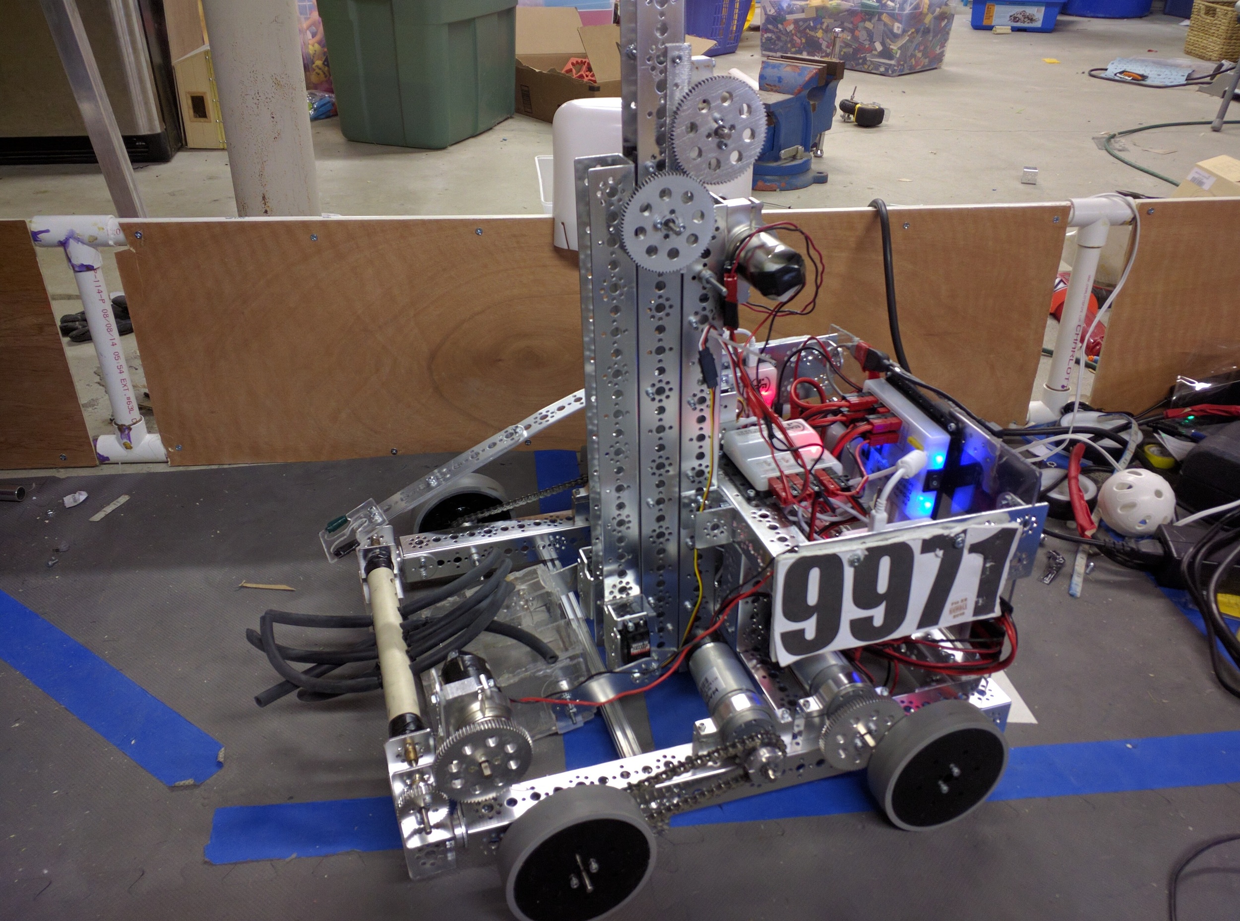 This robot was designed specifically for the "Flashback to the Future" off-season scrimmage that was on May 22nd, 2016. We decided to call it "Throwback" because we had a throwback to Block Party and based it off of some of the old Block Party bots. The reason we modeled it after old Block Party robots was because that since this was an off-season scrimmage they were using a modified RES-Q field but with elements from every past game (hence the name "Flashback to the Future"). When we read the rules for the modified game, we saw that scoring cubes into the Block Party pendulums was the most efficient and effective way to score points. Because of that we decided that it would be a fun off-season project would be to create a whole new robot for this scrimmage that was based on Block-Party designs.