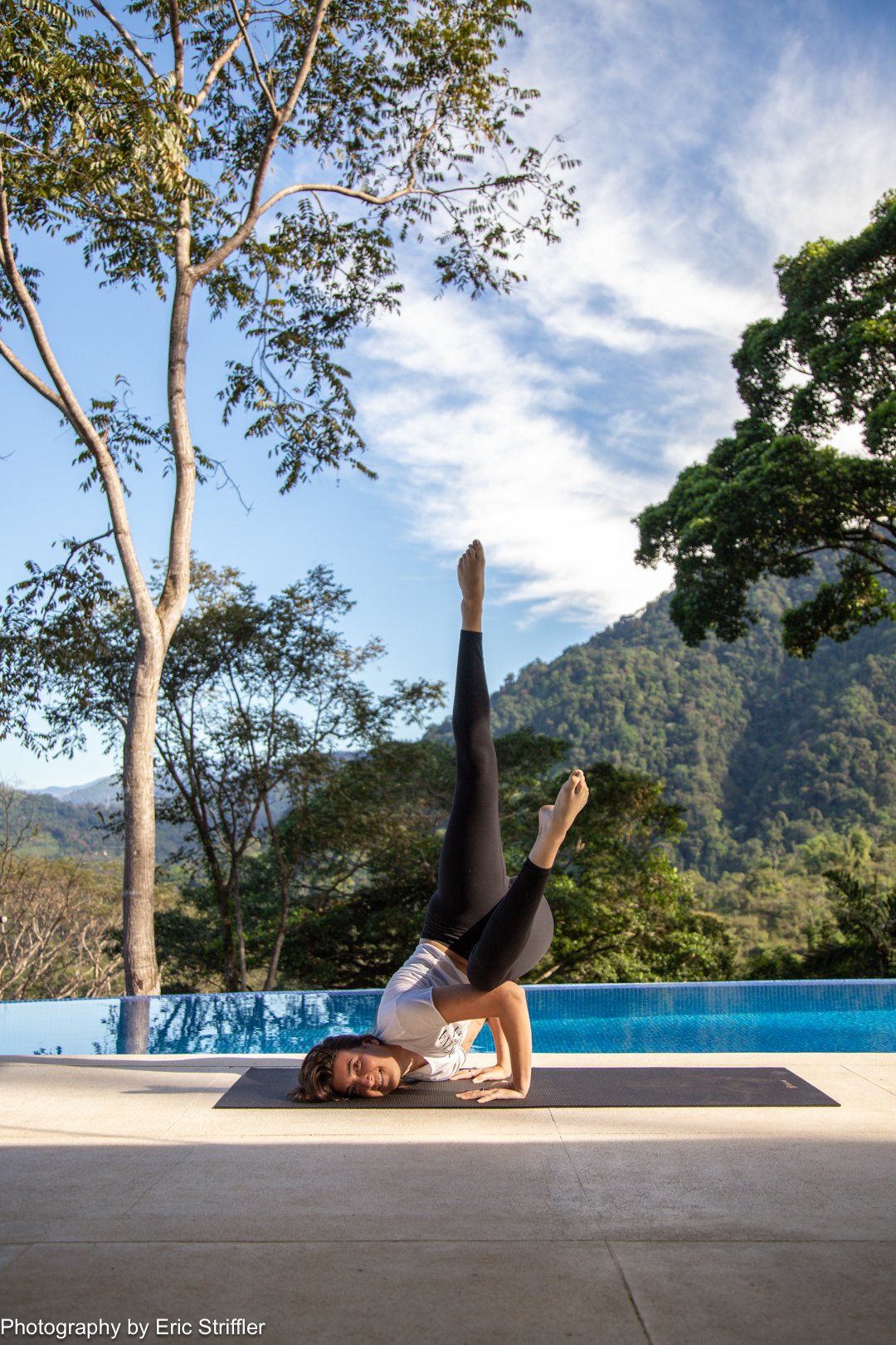 Poolside yoga with an incredible view.