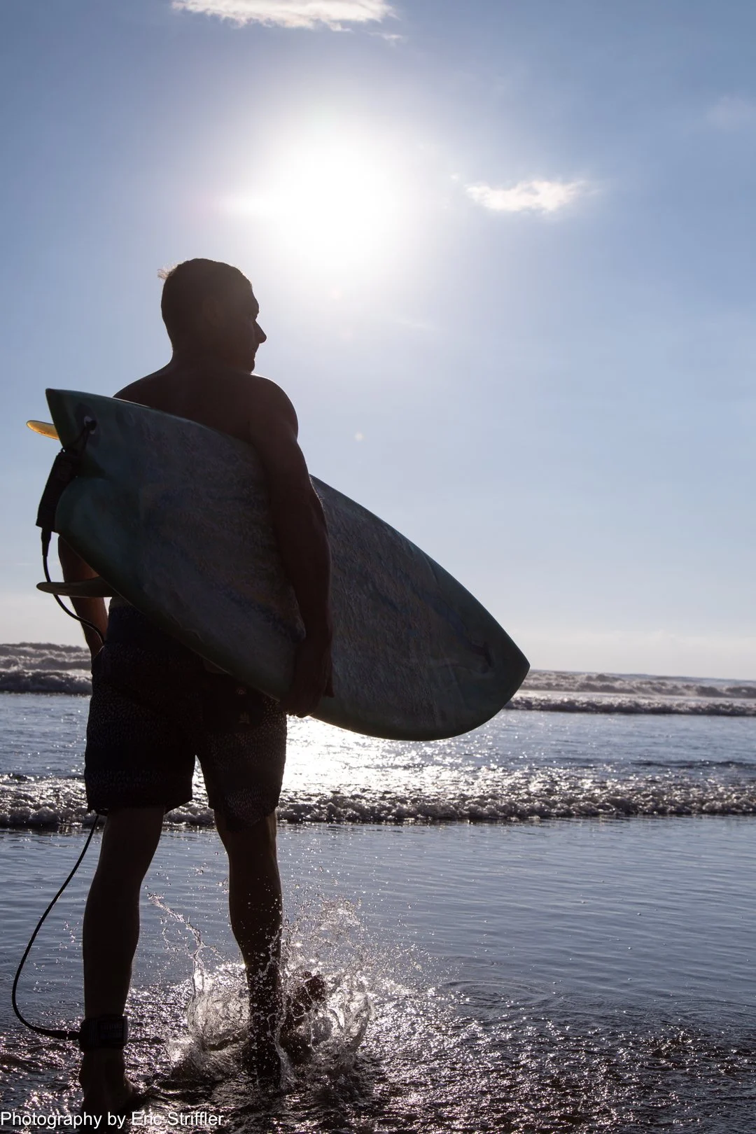 One of dozens of surfers at Playa Dominical