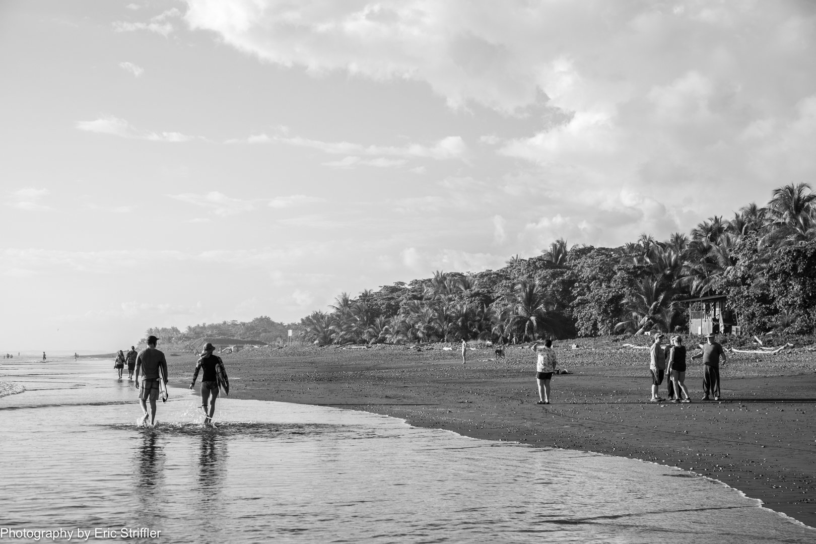 walkers and surfers converge at this popular beach in Costa Rica