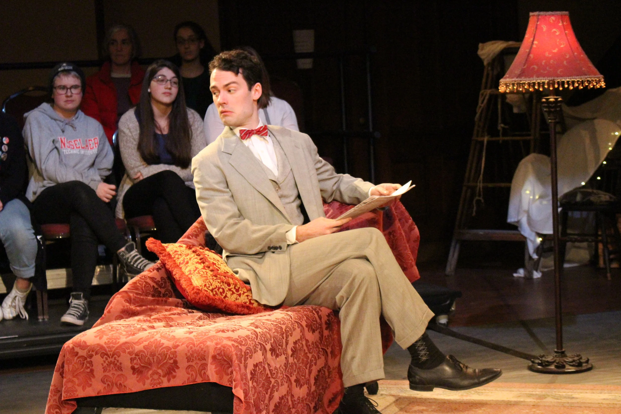 Woodrow leans over his shoulder as Jim, the gentleman caller, in Hubbard Hall's 2017 production of The Glass Menagerie director by Roger Danforth.