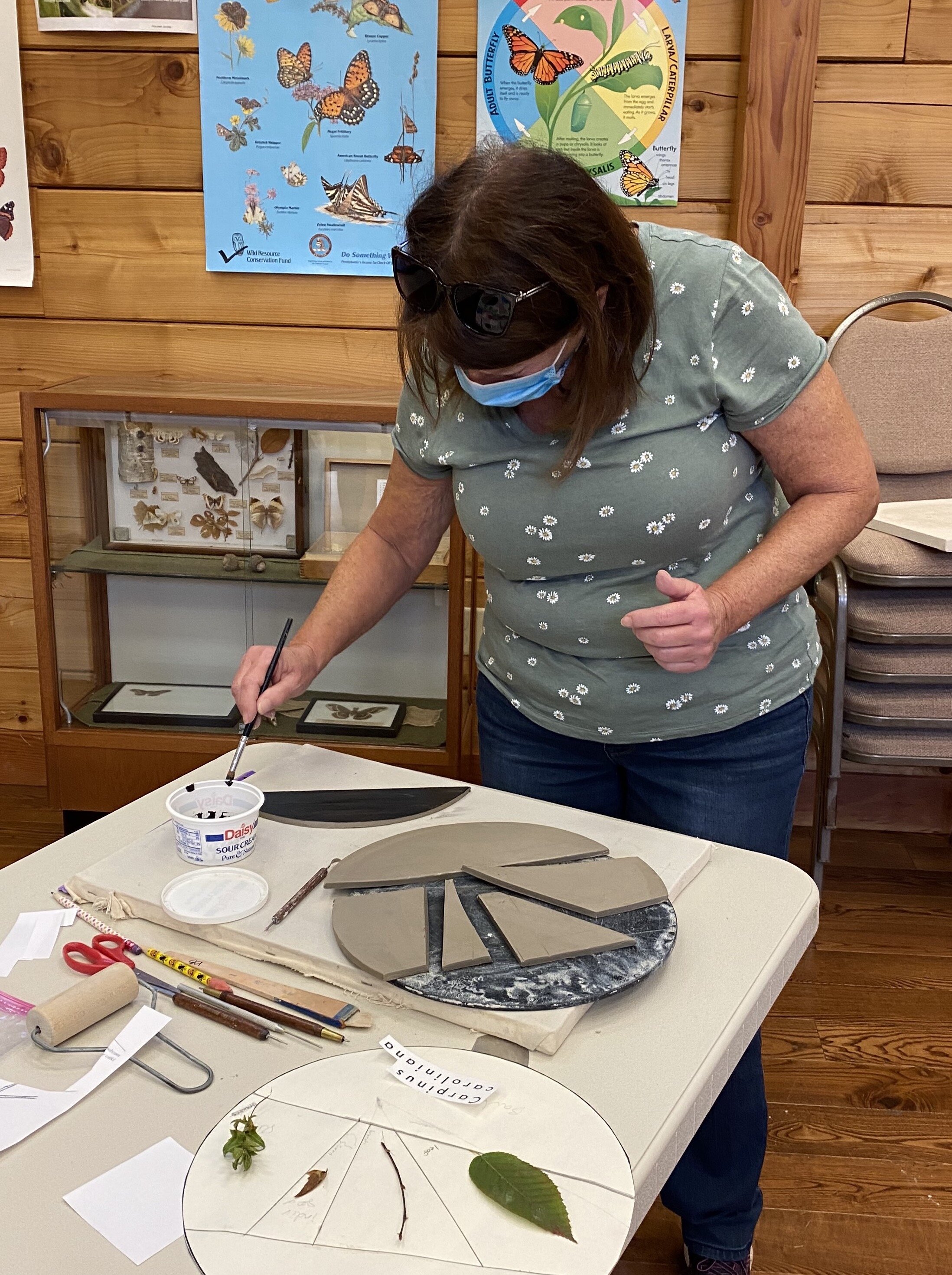  Mary applying underglaze. 