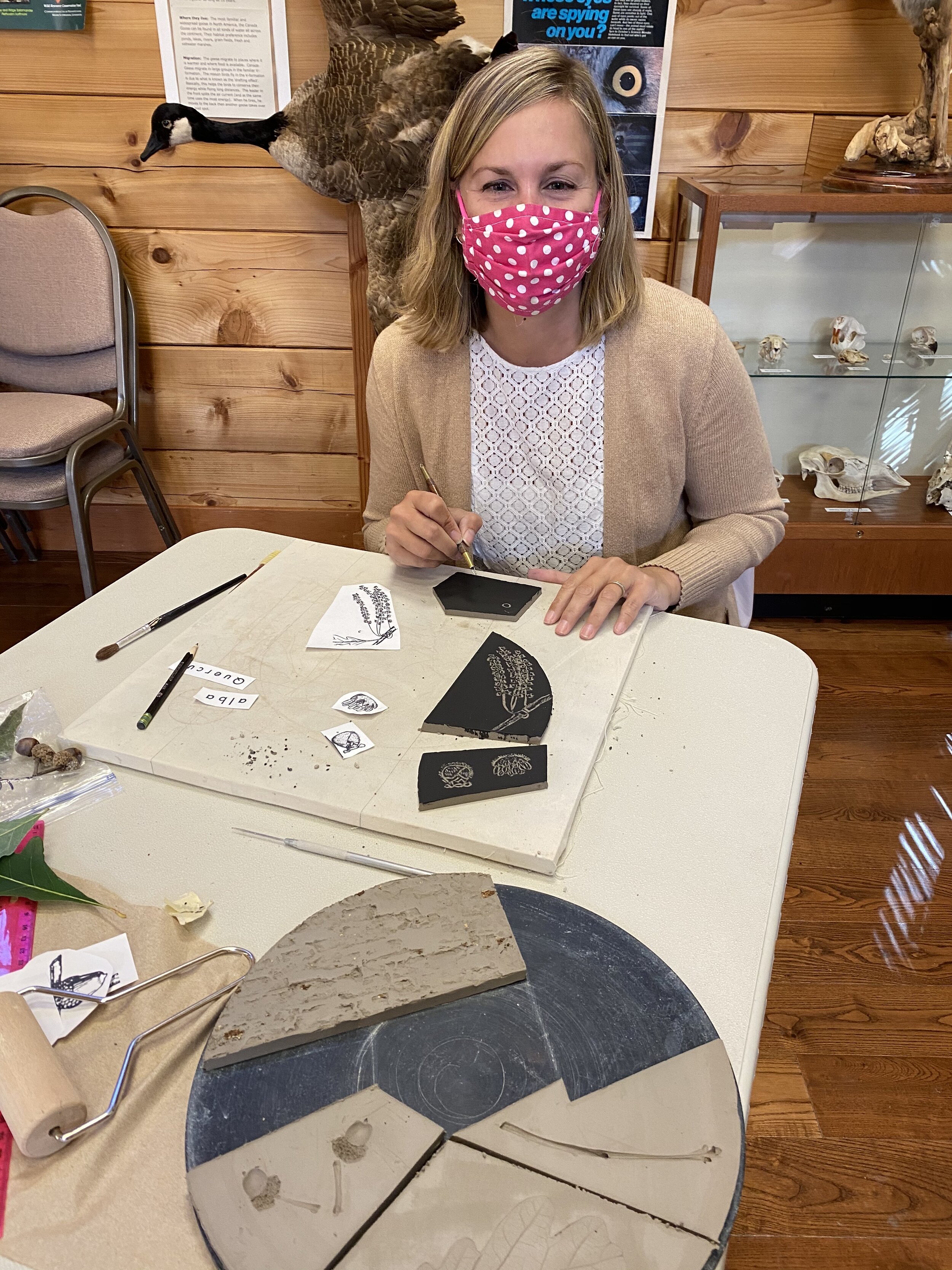  Jess working on sgraffito tiles for the White oak tree. 