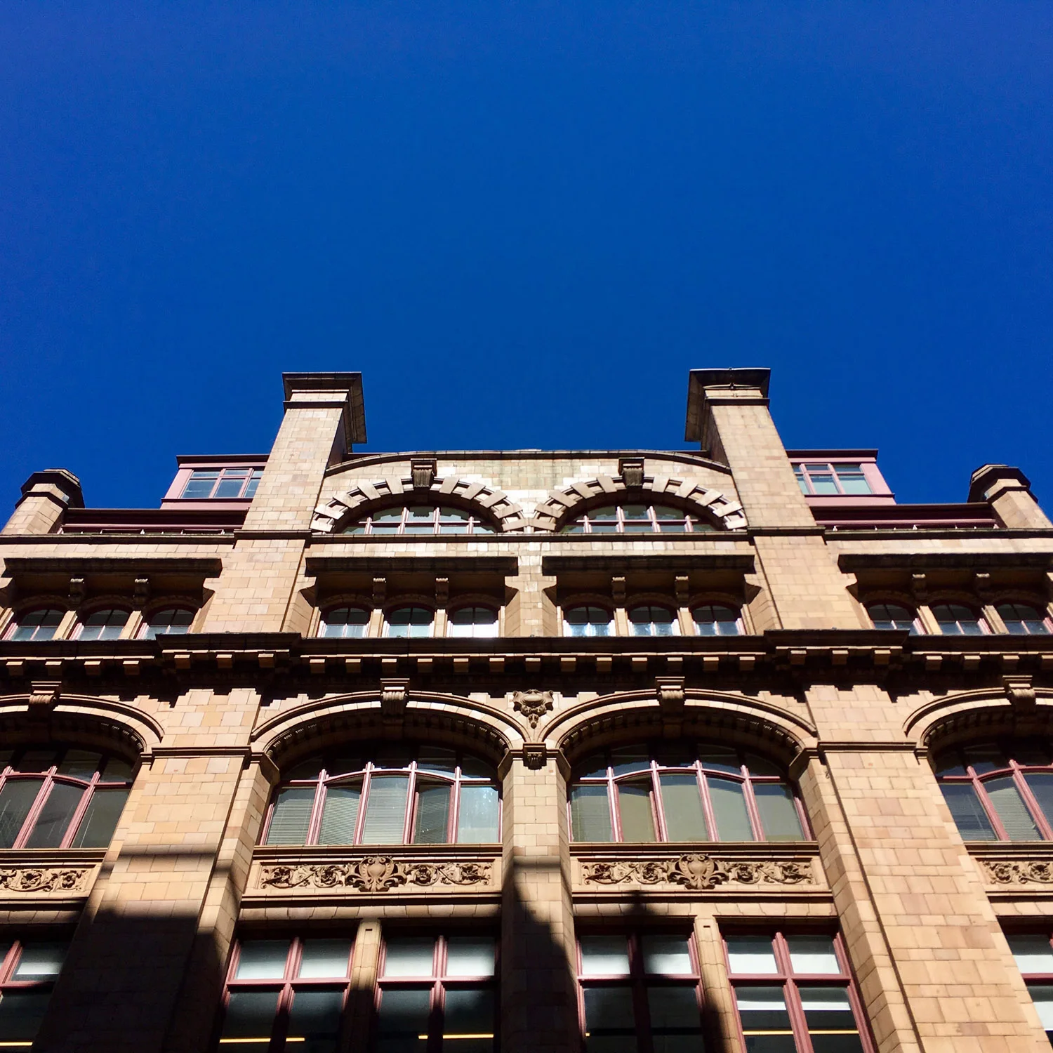 Chimney stacks beautifully integrated into the facade design, these were originally connected the the boiler in the basement and provided heat to the whole building