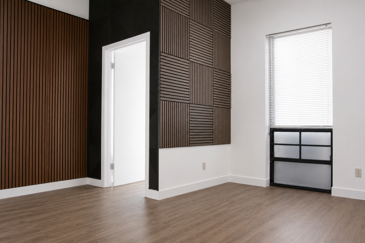 Empty room with wood flooring, a window with blinds, and decorative wood wall panels.