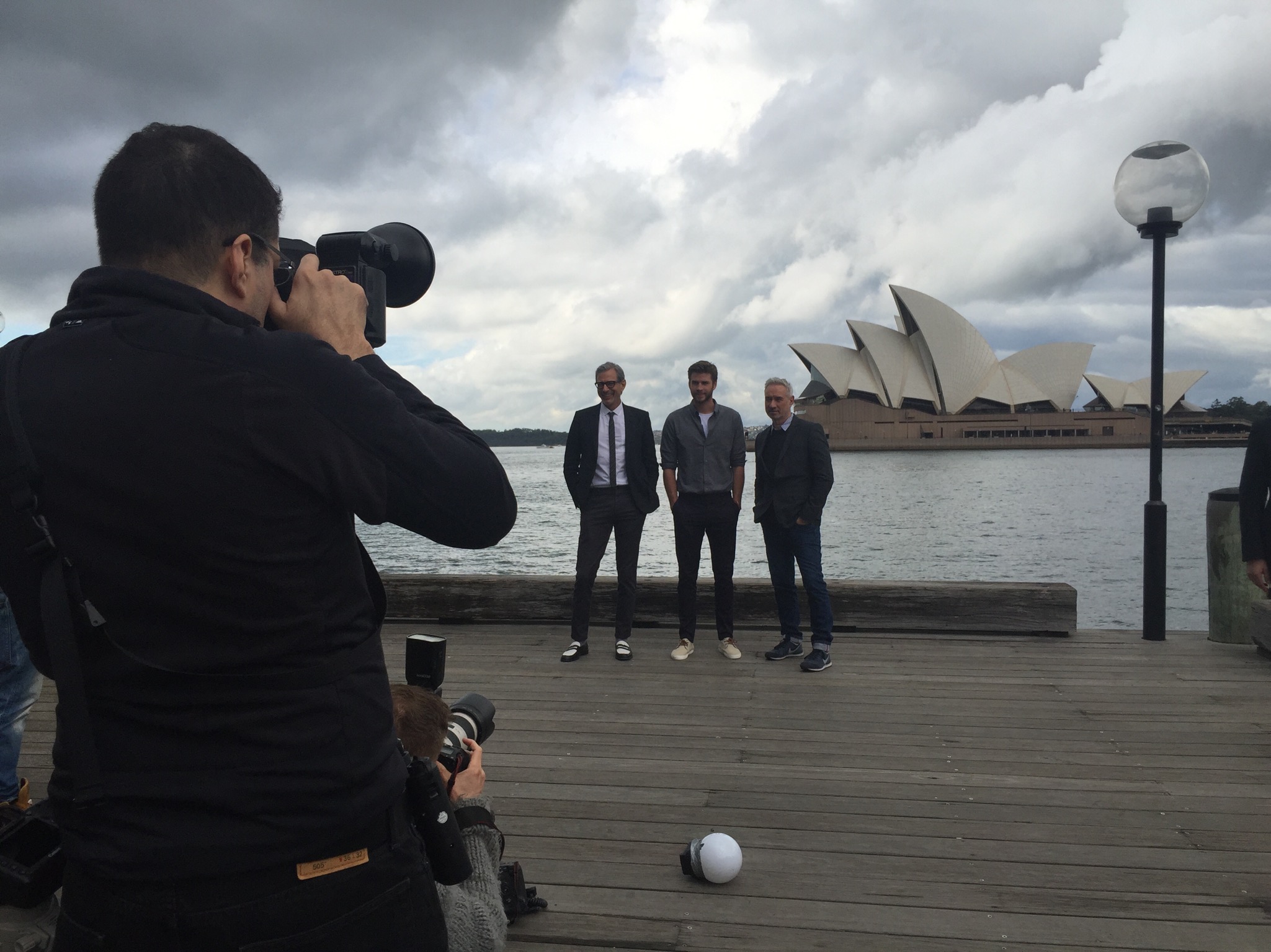 Roland, Jeff, and Liam at a photoshoot in front of the Sydney Opera House