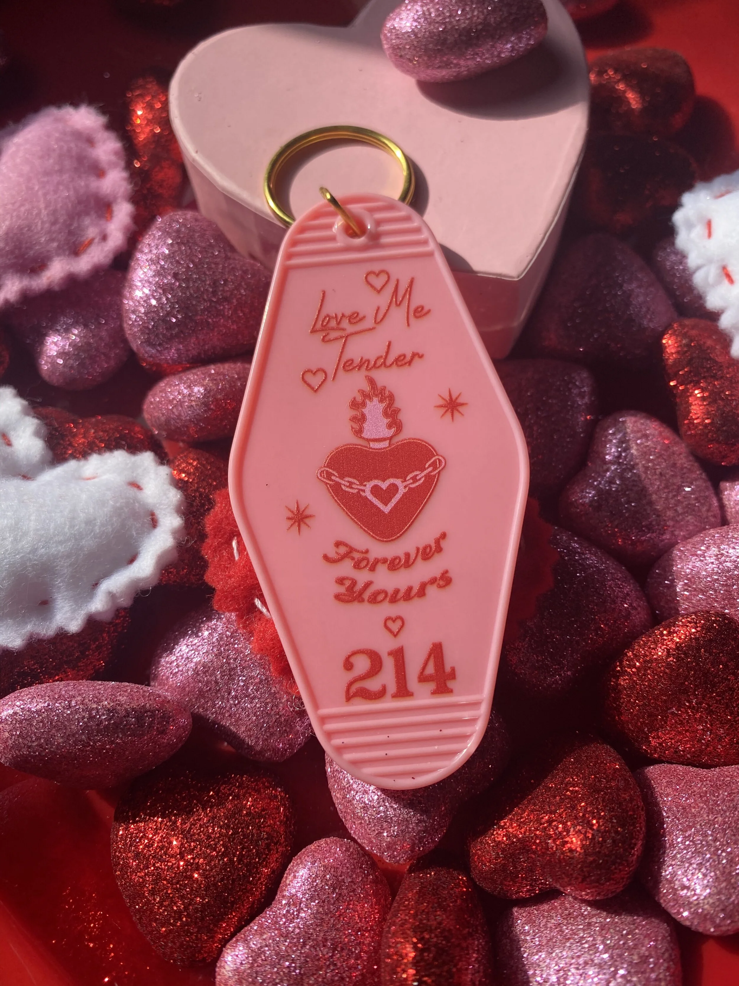 love me tender motel keychains 