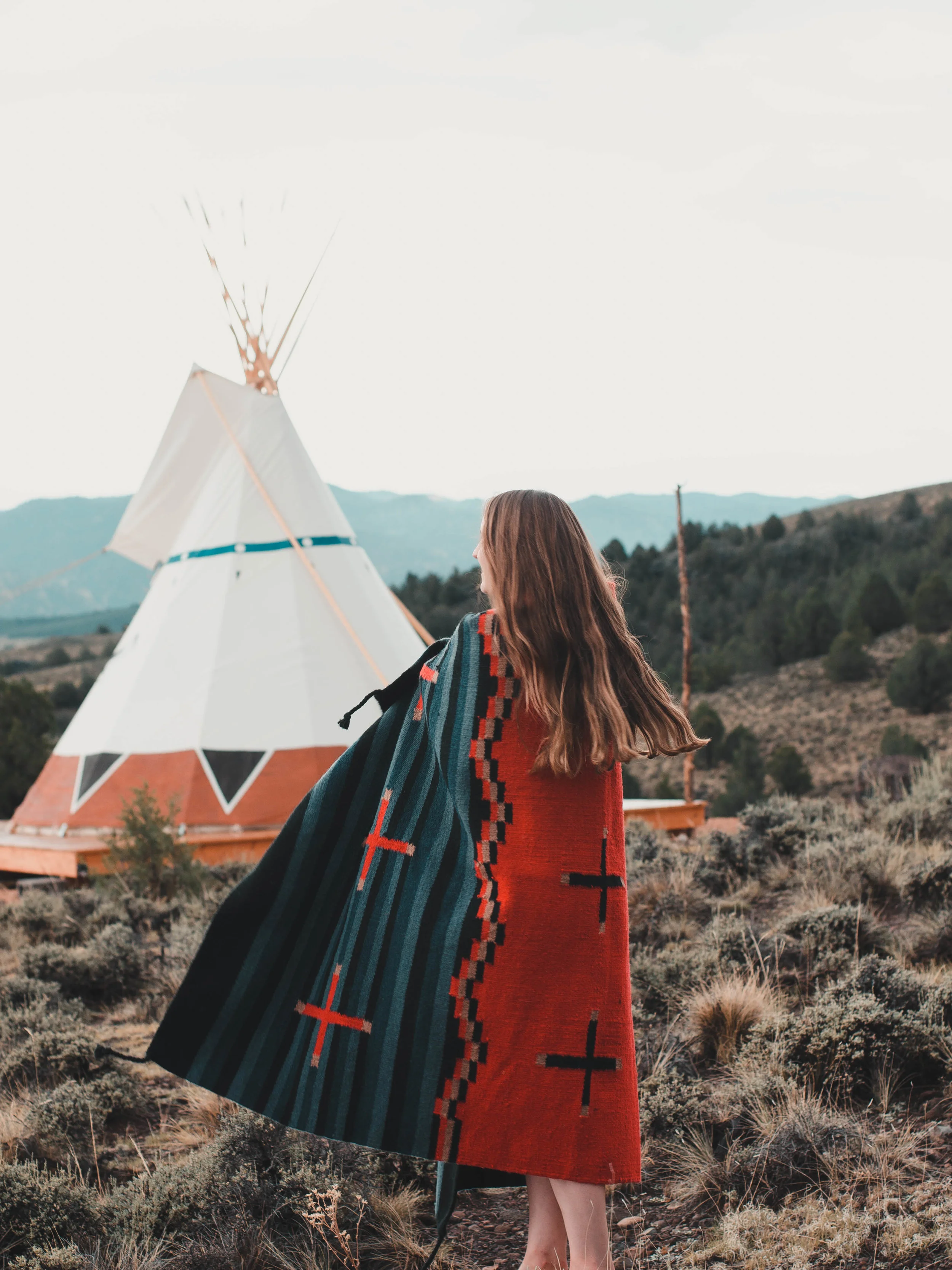 Enjoying the Pendleton blankets at our tipi rental