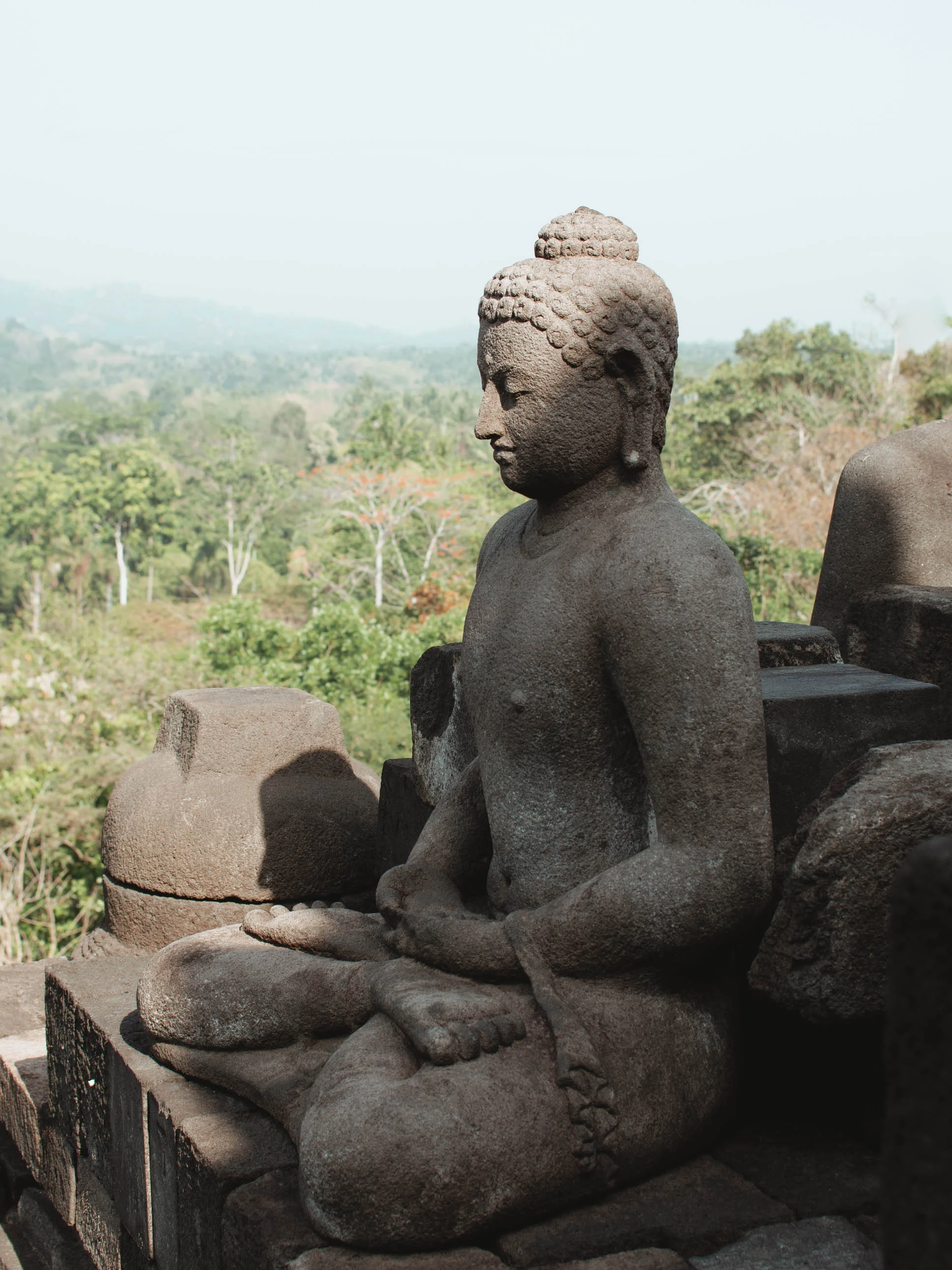 A carving of Buddha at Borobudur temple in Yogyakarta, Indonesia