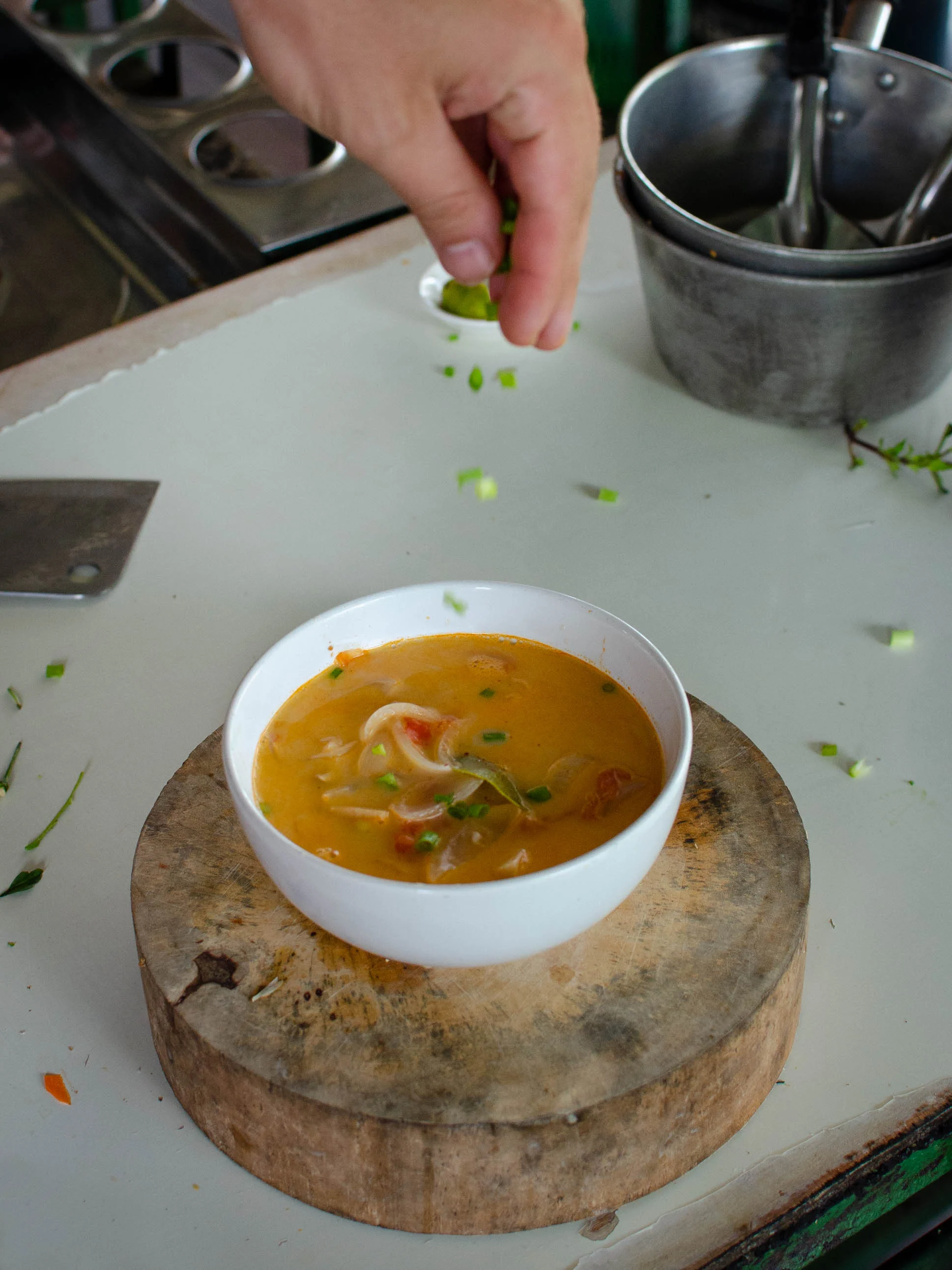 Thai Cooking Class in Chiang Mai | Putting the finishing touches on our soup