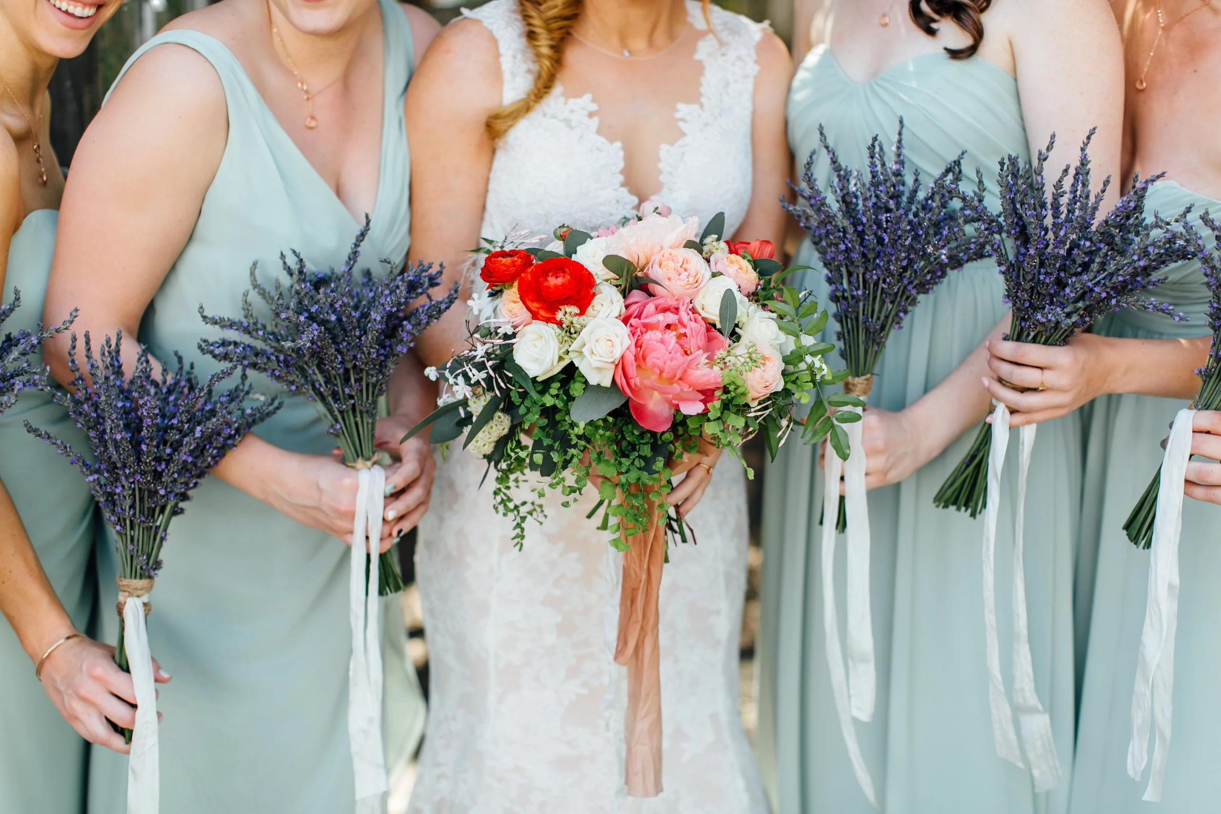 I loved the simple lavender bouquets for the bridesmaids and all the fun pops of color for Stephanie's bouquet. Eden Floral nailed it! 