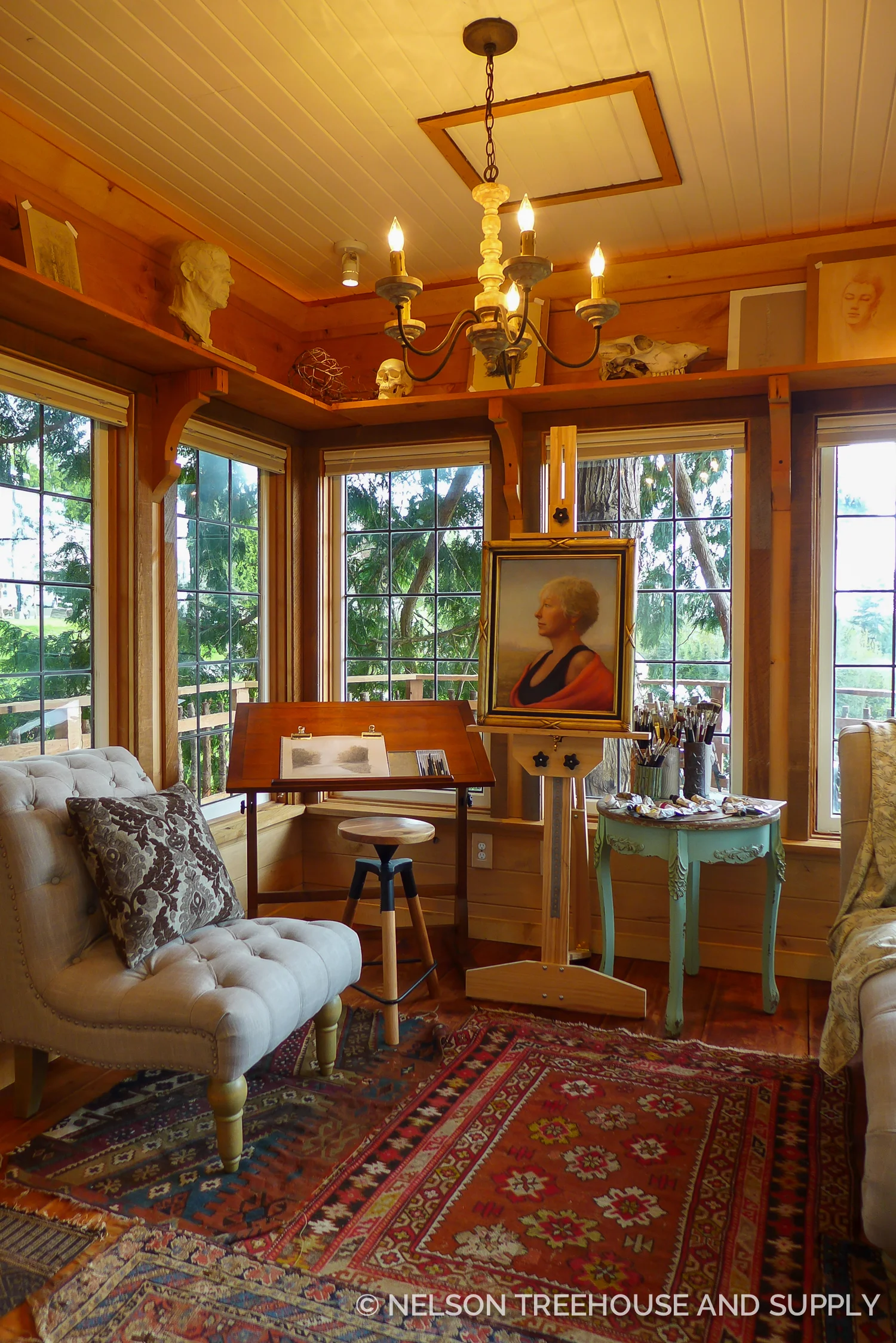 A high, wraparound shelf provides extra storage and exhibit space.