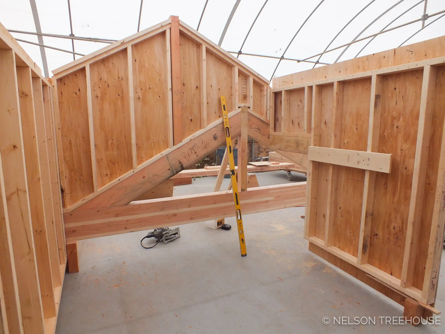TREEHOUSE LOFT ROOFLINE MOCKED UP IN PREFAB SHOP