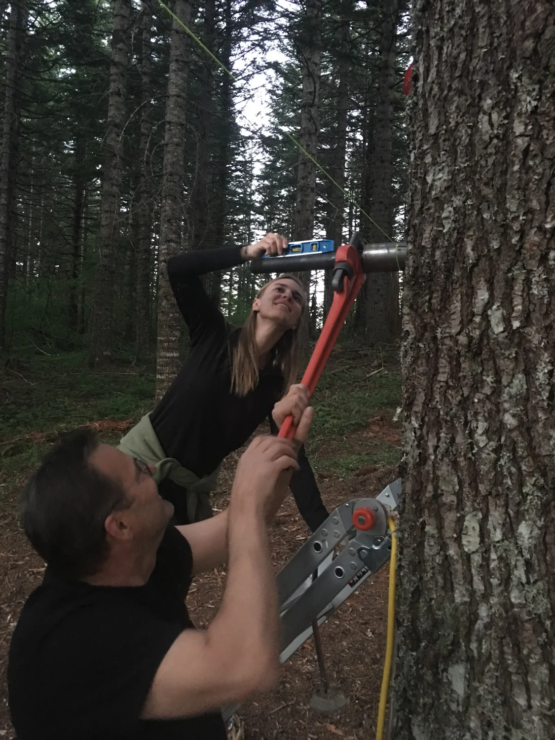 Jena and phil working together to install a TAB.