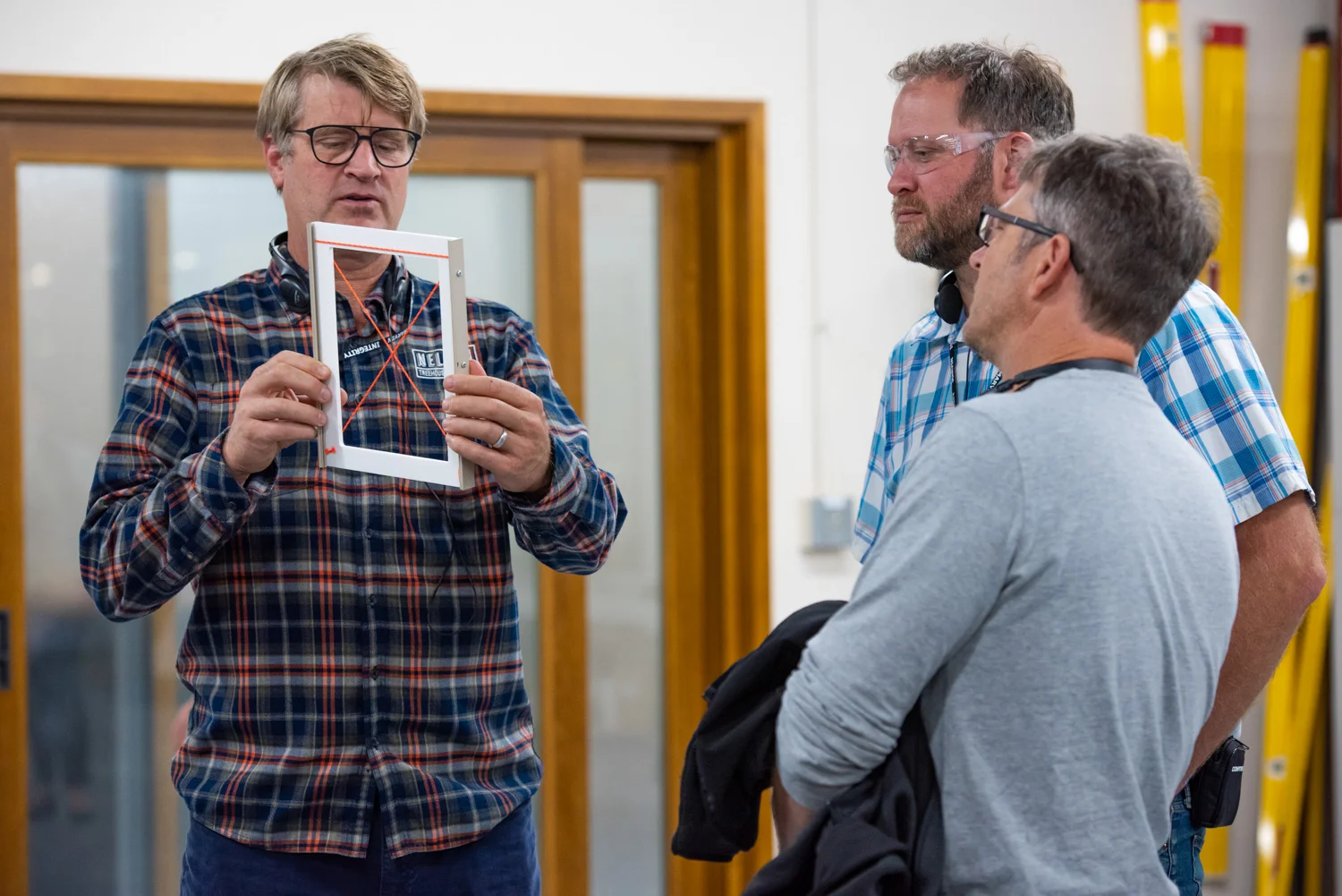 Pete Nelson and Project Managers Daryl McDonald and Toby Maloy learning about the Marvin production process. PHoto courtesy of Marvin.