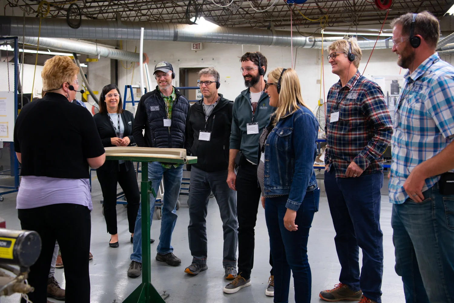 Marvin Tour guide KarLynn Erickson (Pictured On Far Left) leAdIng the Nelson Treehouse crew through the Factory. PHoto courtesy of Marvin.