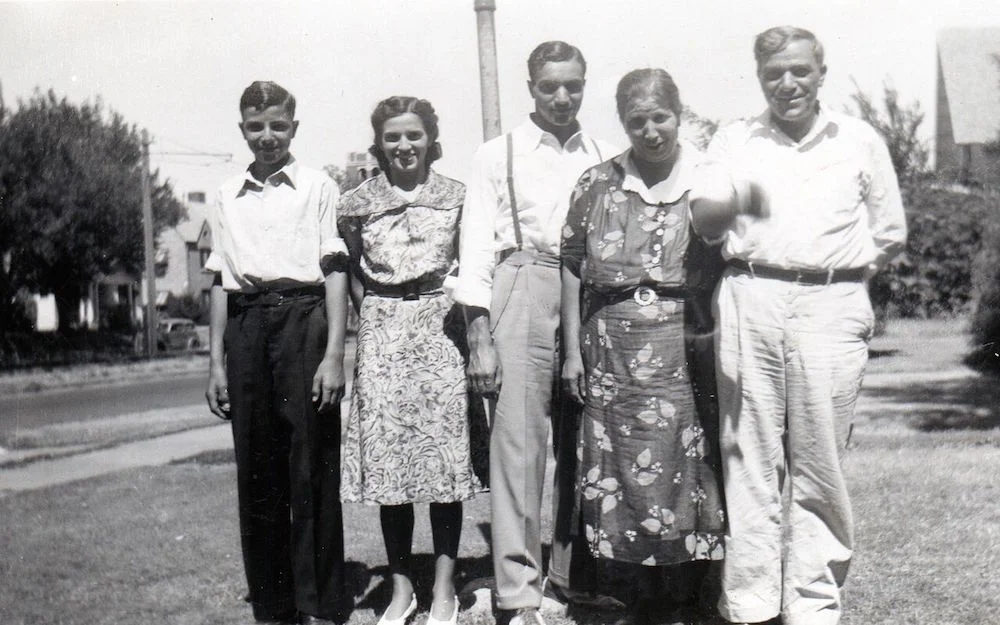 George at left with his sister Julia, brother Sam, mother Saida, and father Charlie.
