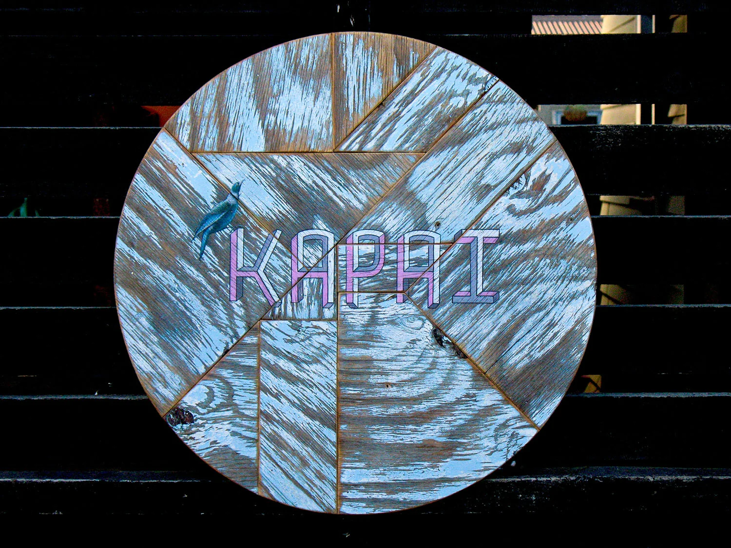 Kapai-Rust-round-artwork-by-Tony-Harrington